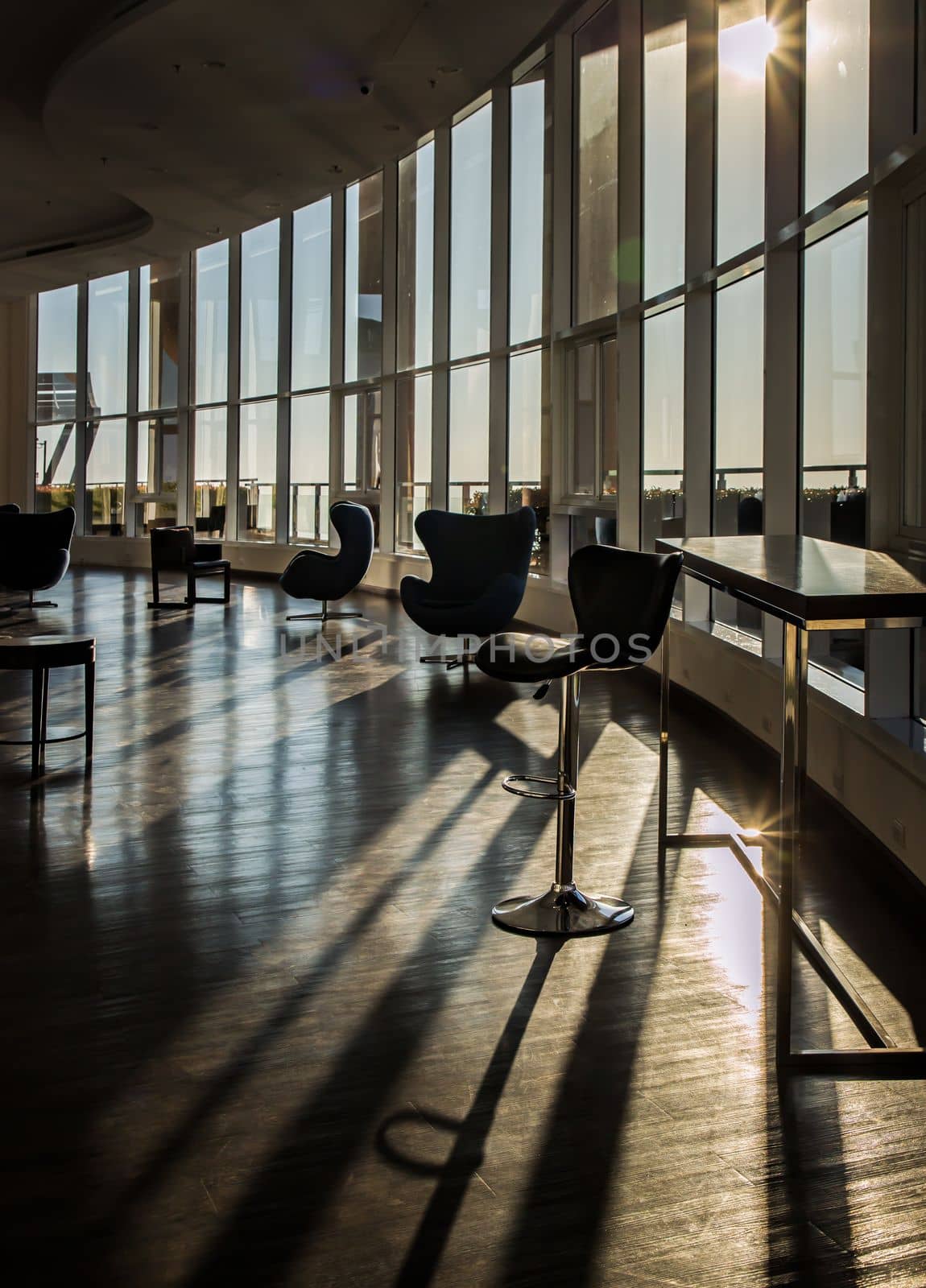 Bangkok, Thailand - Jan 10, 2022 : Common area of condominium in morning. New normal, The seats were set separately according to social distancing policy for the spread of covid-19 prevention, Selective focus.