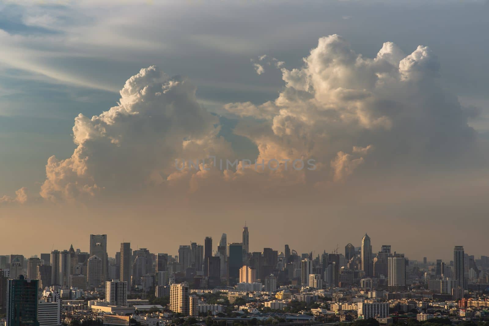 Bangkok, Thailand - May 09, 2021 : Aerial view of Beautiful scenery view of Skyscraper Evening time before Sunset creates relaxing feeling for the rest of the day. Selective focus.