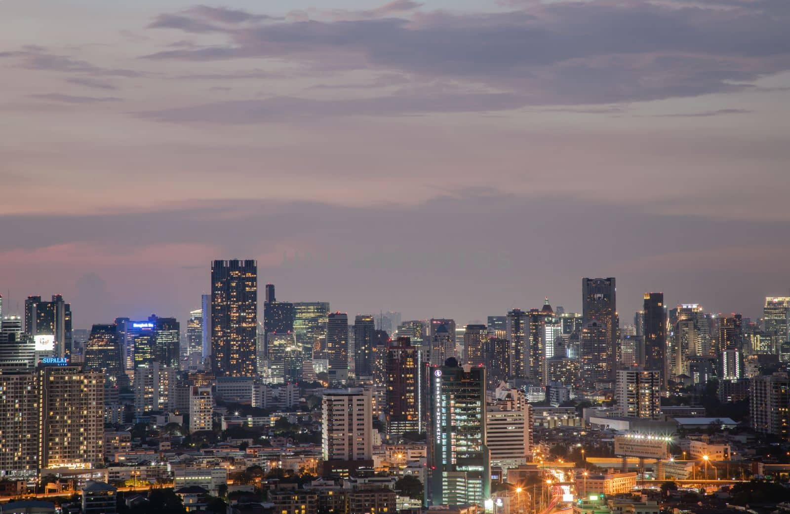 Bangkok, Thailand - May 09, 2021: Aerial view of Beautiful scenery view of Skyscraper Evening time Sunset creates relaxing feeling for the rest of the day. Selective focus.