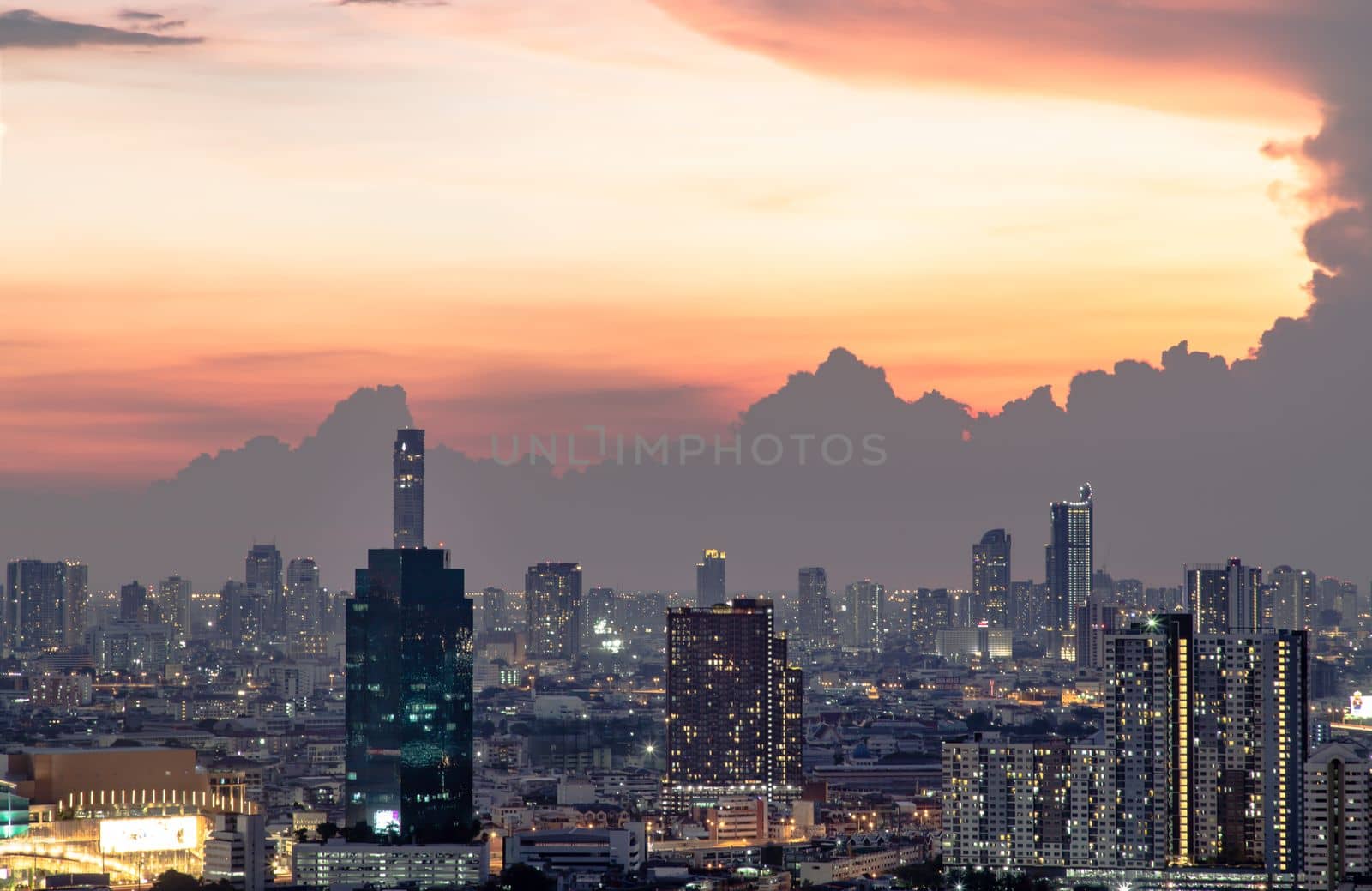 Bangkok, Thailand - May 09, 2021: Aerial view of Beautiful scenery view of Skyscraper Evening time Sunset creates relaxing feeling for the rest of the day. Selective focus.