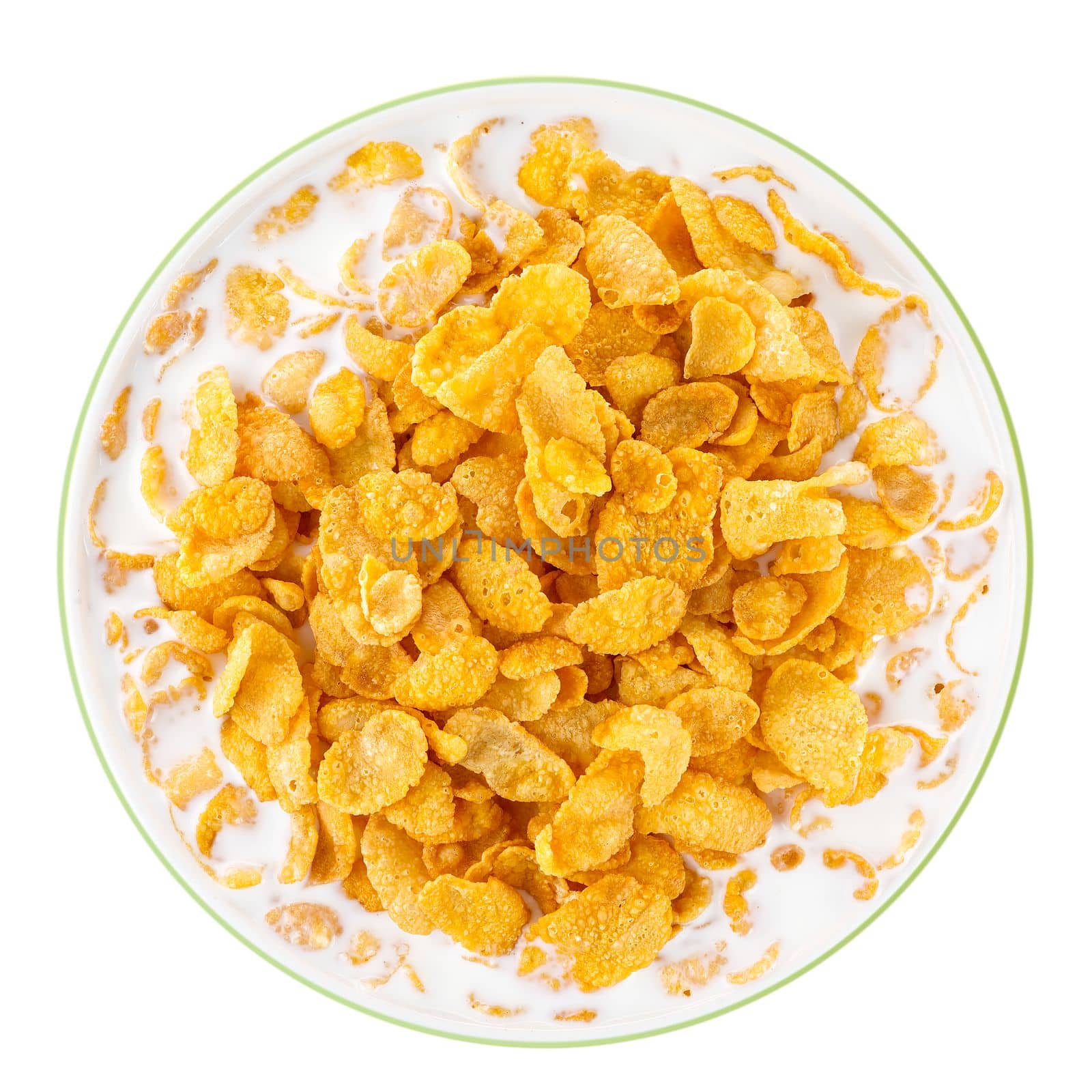 Bowl of sweet cornflakes with milk isolated on white background, top view. Corn flakes with milk splashes isolated on white