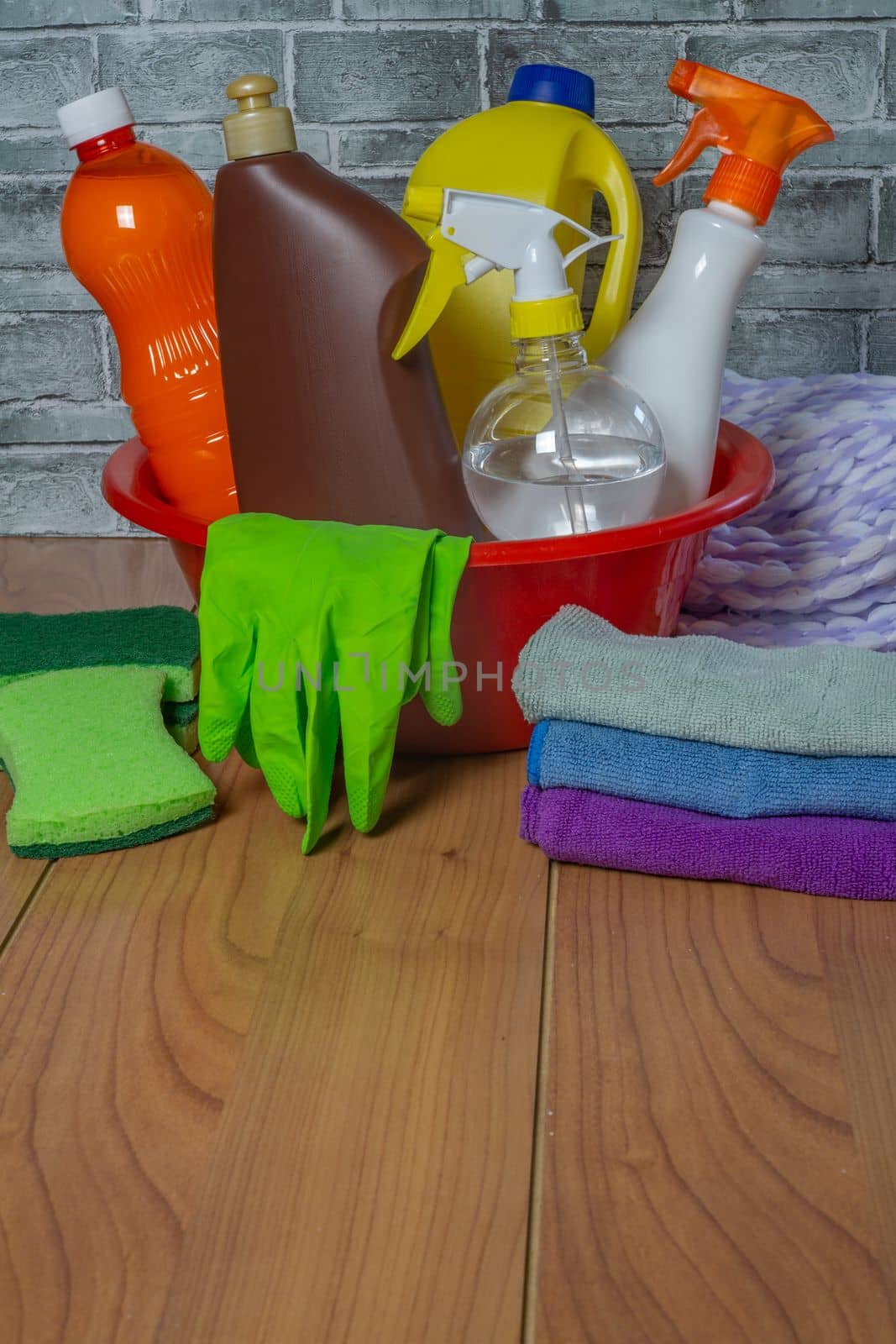 woman using cleaning products at home
