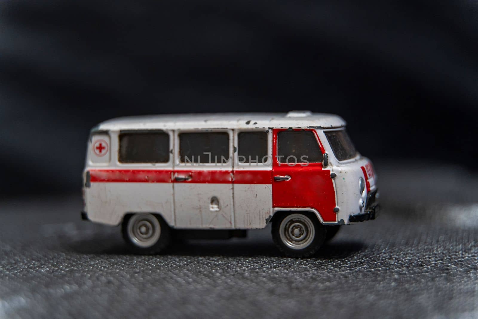 modelka toy car ambulance. Medical transport vehicle. red cross. Ambulance model.