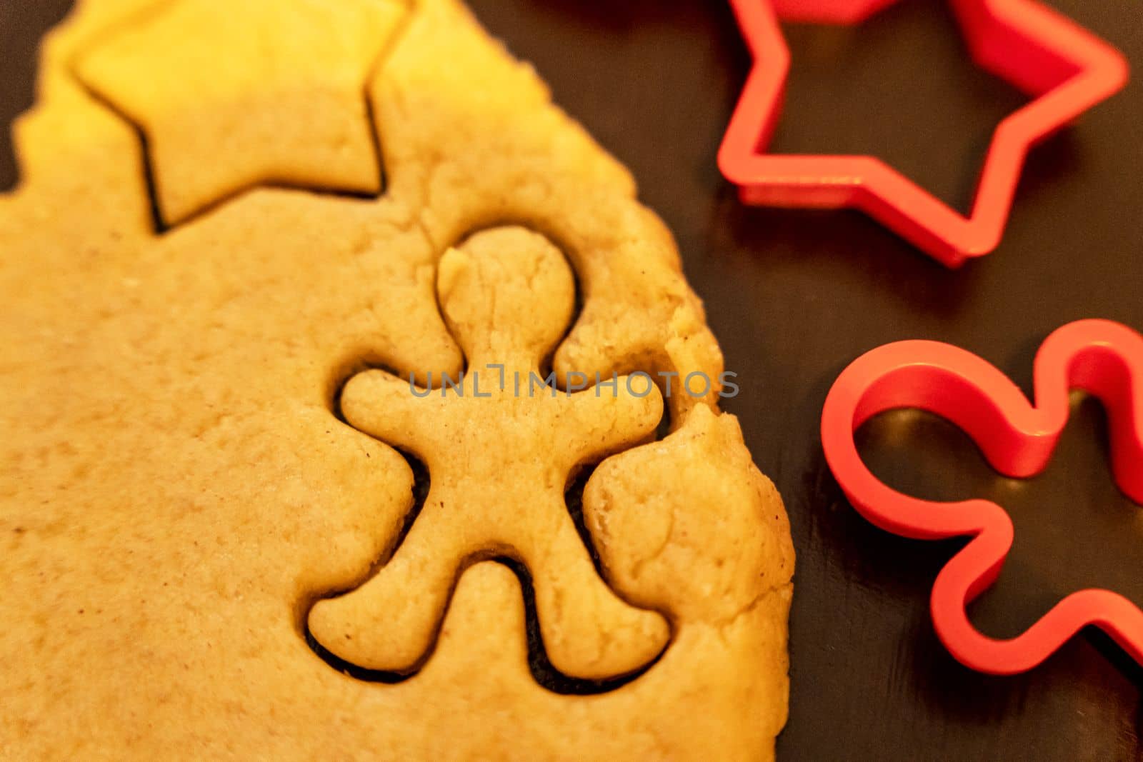 cookie cutter . Dough for preparing cookies. mold for making cookies. cutting the dough with the molding trim.