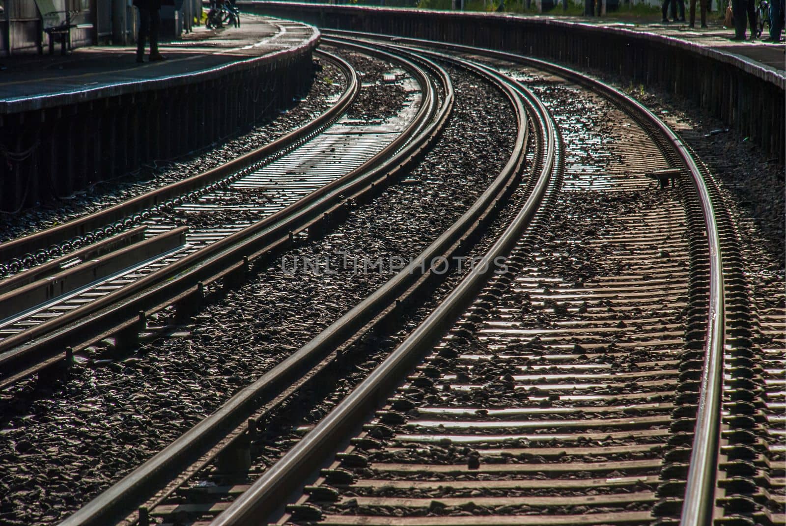 Railroad crossing and evening train in the richmond, London