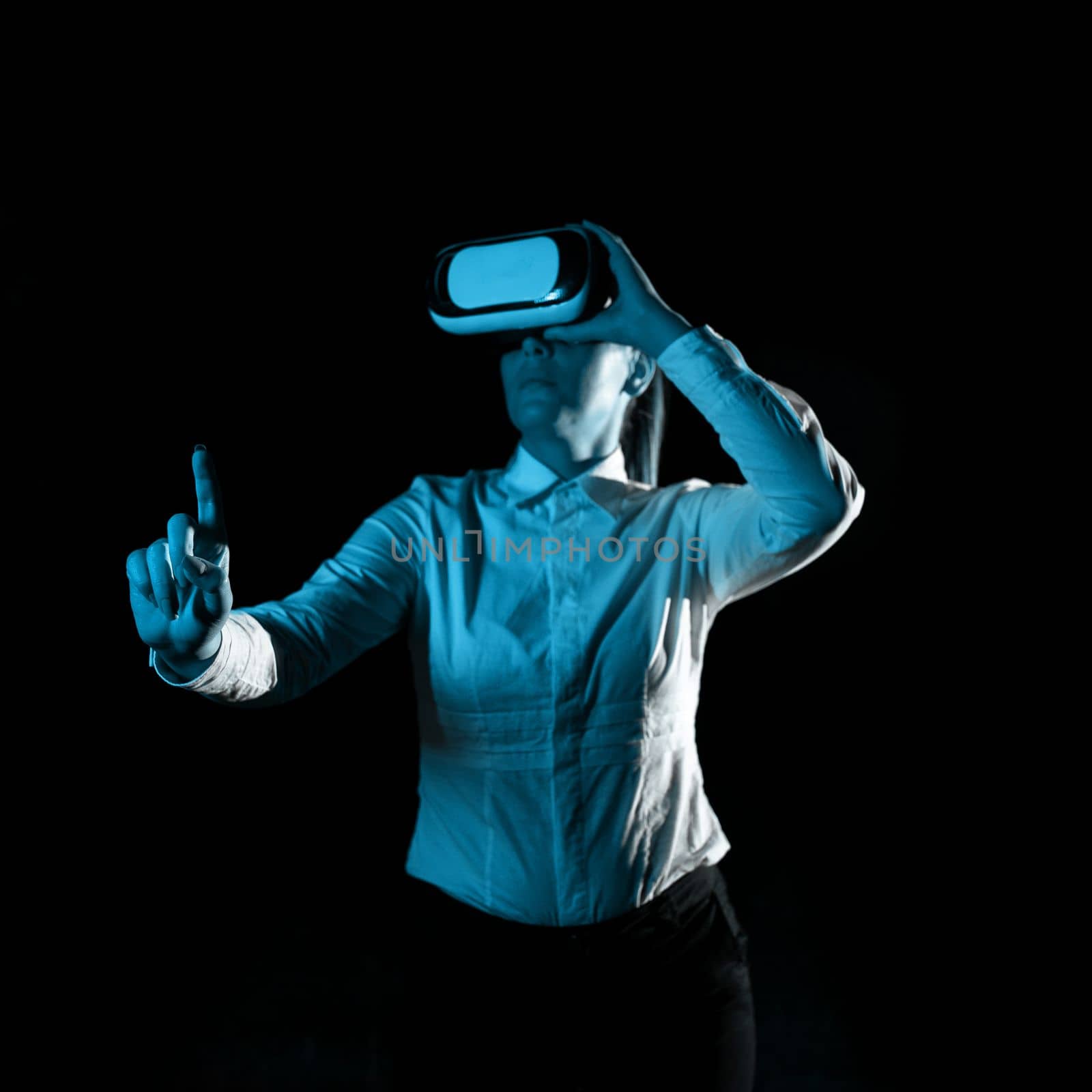Woman Wearing Vr Glasses And Pointing On Messages With One Finger.
