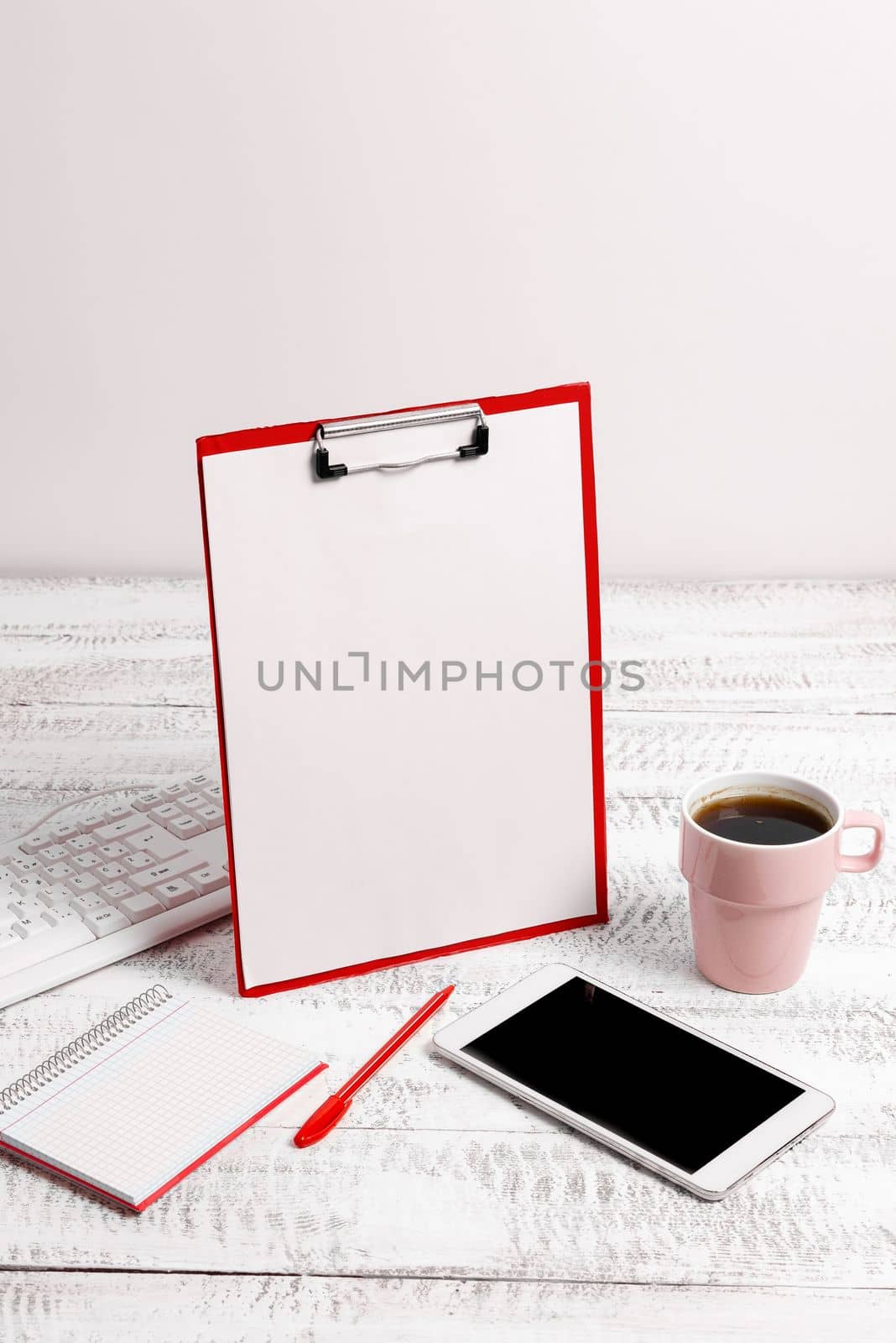 Notebook With Important Messages On Desk With Coffee, Phone And Pen. Crutial Informations Written On Pad On Table With Cup, Memos And Pencil. Late Updates Presented. by nialowwa