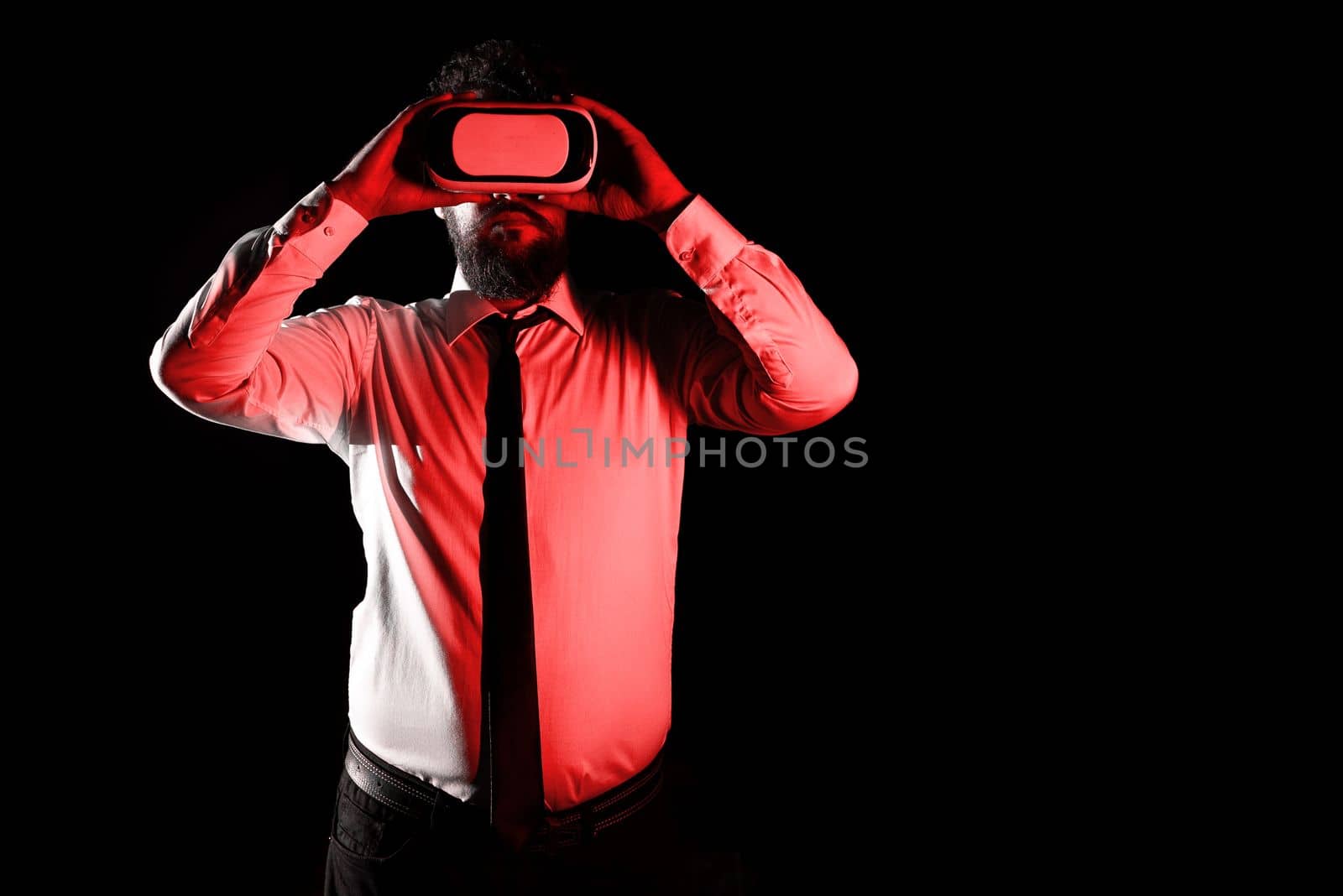 Man Wearing Vr Glasses And Looking On Important Messages. Businessman Having Virtual Reality Eyeglasses And Showing Crutial Informations. by nialowwa