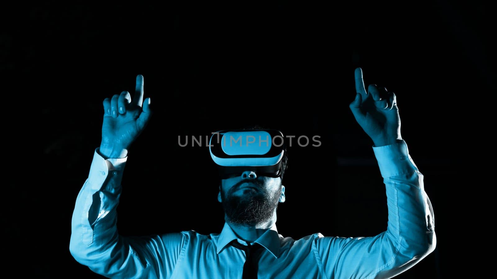 Man Wearing Vr Glasses And Pointing On Important Messages With two Fingers.