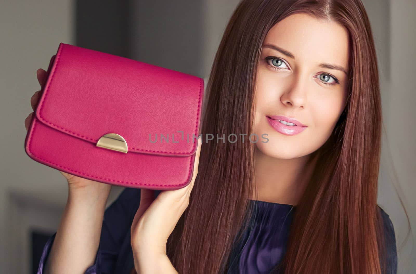 Fashion and accessories, happy beautiful woman holding small pink handbag with golden details as stylish accessory and luxury shopping concept