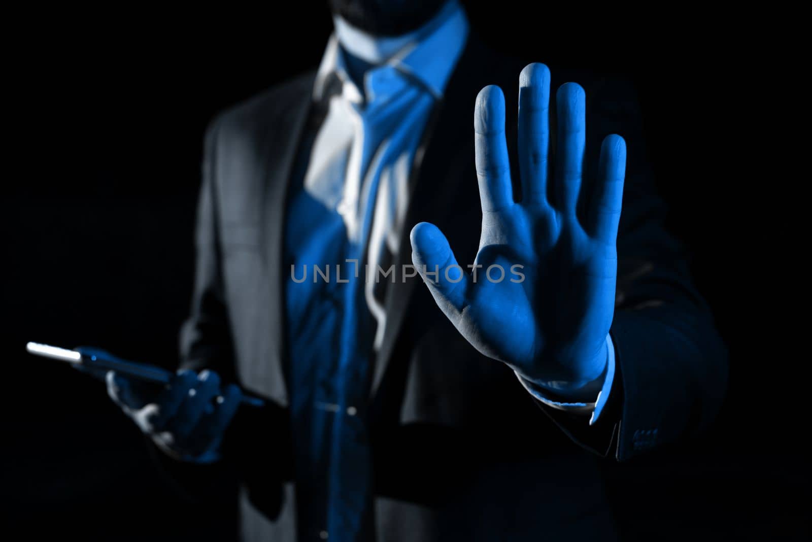 Man Holding Mobile Phone and Holding On Recent Updates With One Hand.