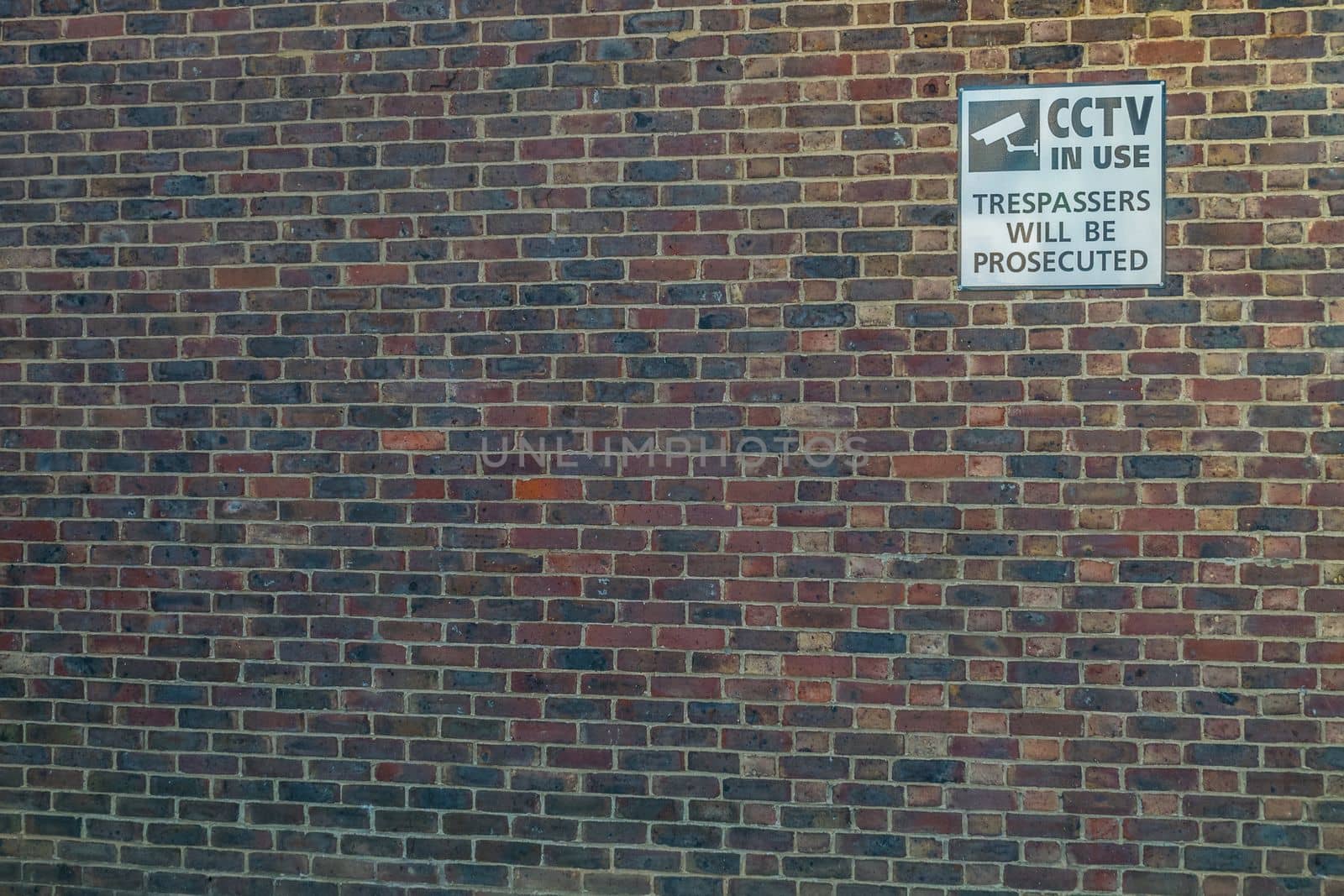 Walls with signs indicating the control area of the CCTV security system Suitable for background images