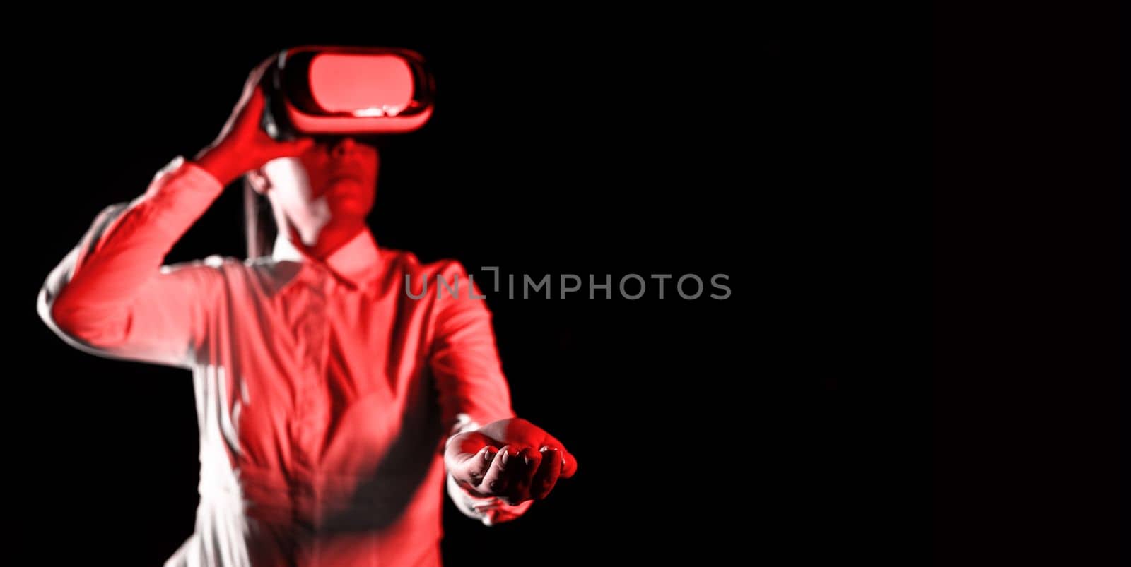 Woman Wearing Vr Glasses And hord Important Messages With one hand.