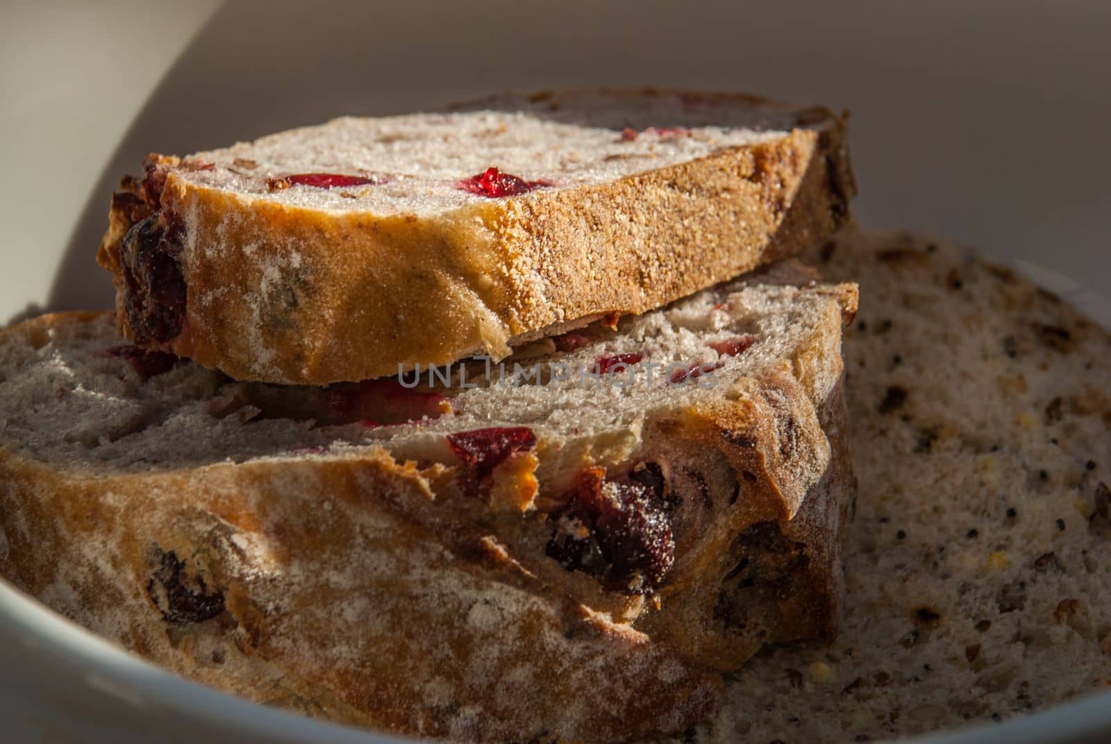 Cranberry walnut bread in a white bowl For breakfast