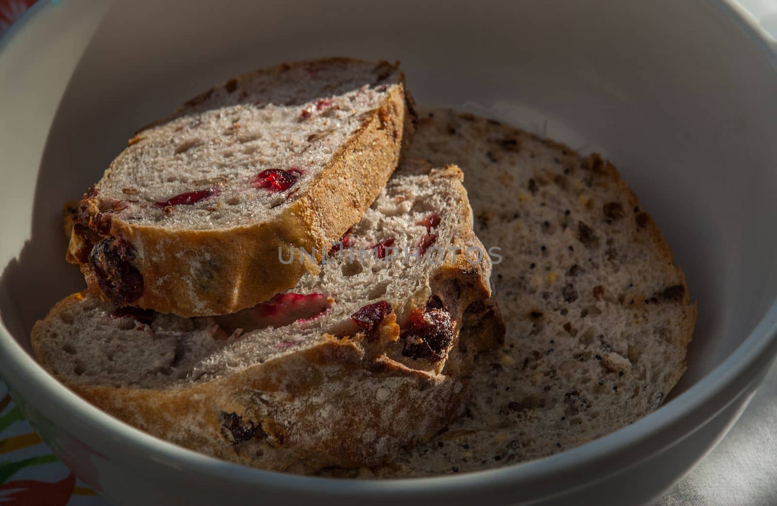 Cranberry walnut bread in a white bowl For breakfast