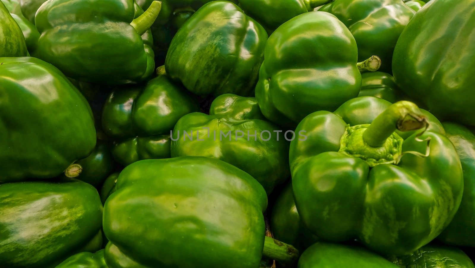 Picture of sweet green pepper (green Capsicum) In the market.