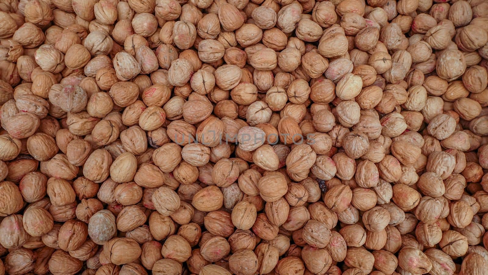 Bunch of whole walnuts. Healthy diet composition Suitable for making background images.