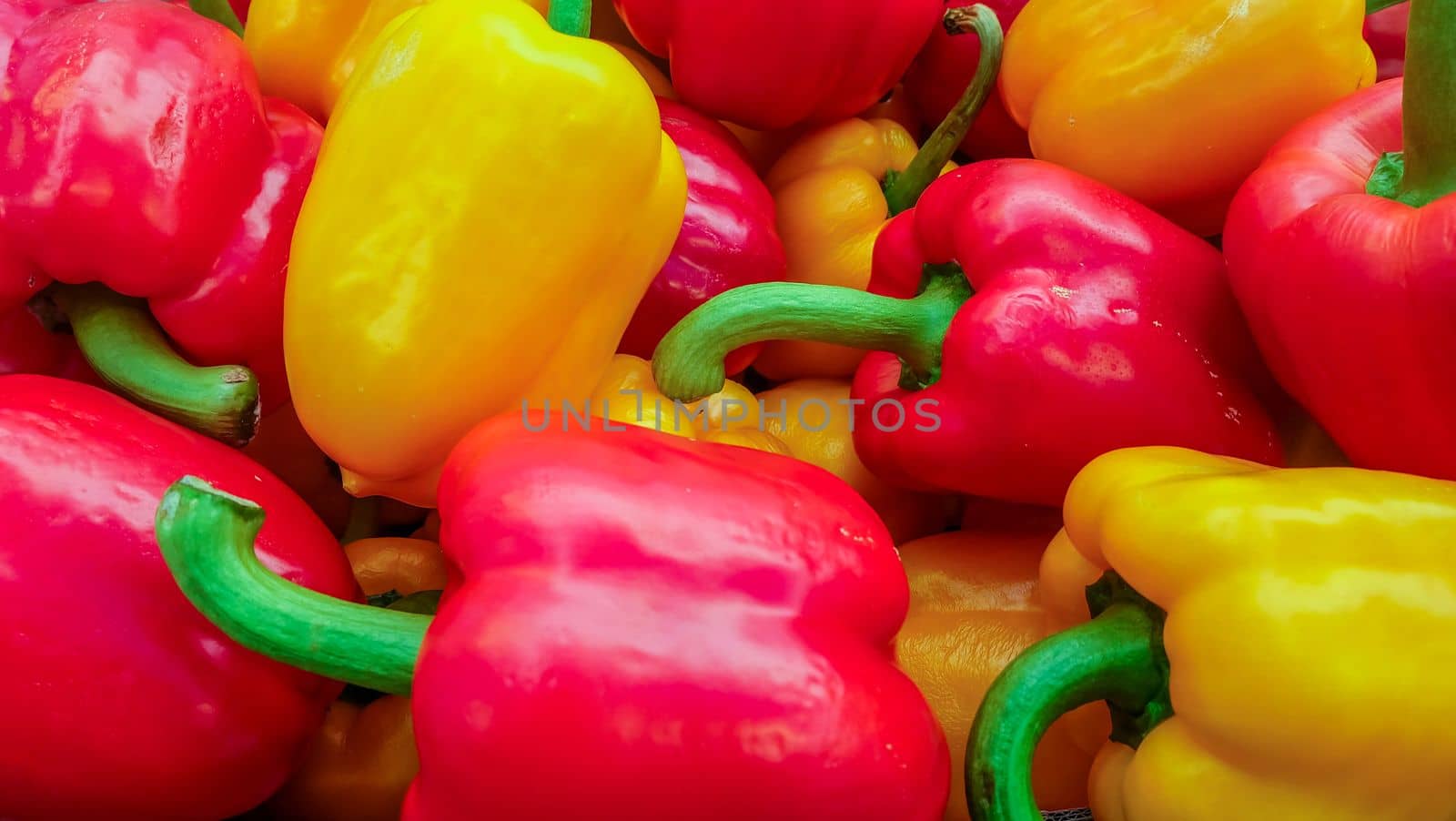 Picture of colorful yellow & red sweet pepper (Capsicum) In the market.