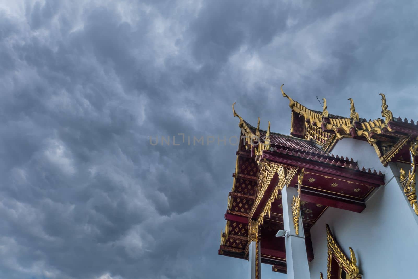 The roof of the Thai temple, along with the gable at the top of the church with a sky backdrop Suitable for making background images.