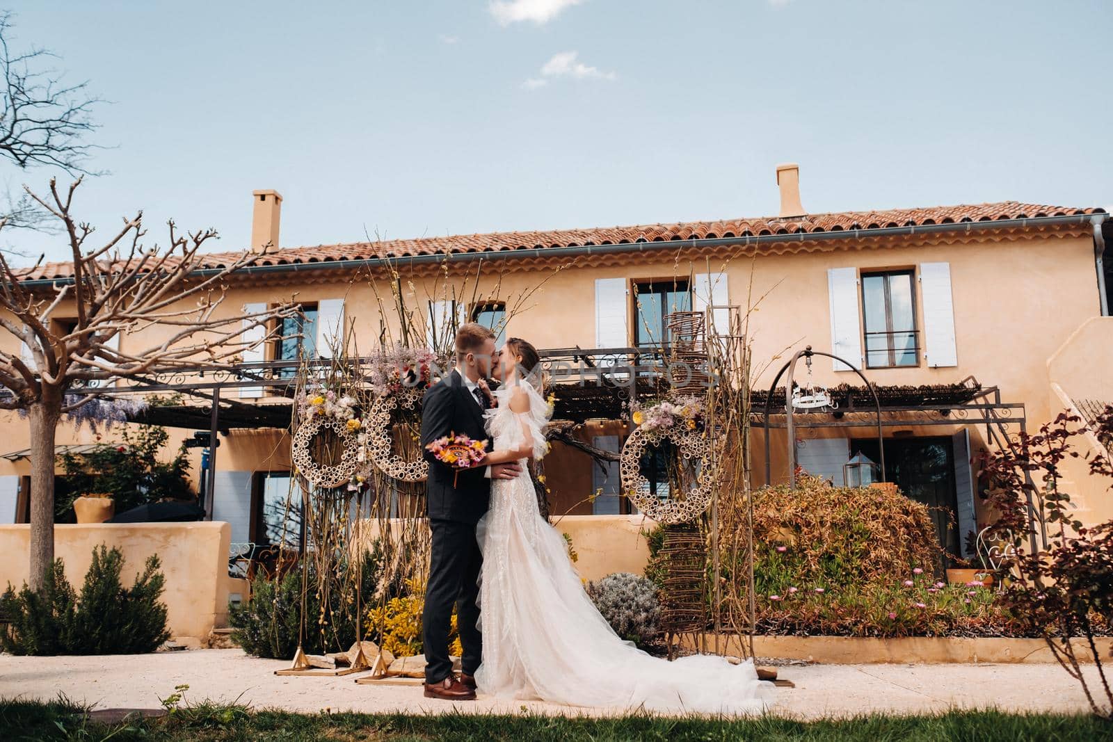 Wedding couple near a Villa in France.Wedding in Provence.Wedding photo shoot in France by Lobachad