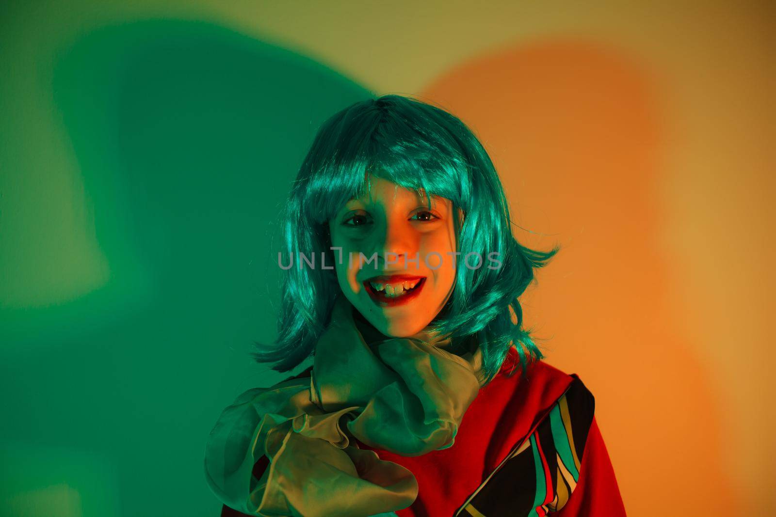 Portrait of a glamour little girl wearing colorful wig by bepsimage