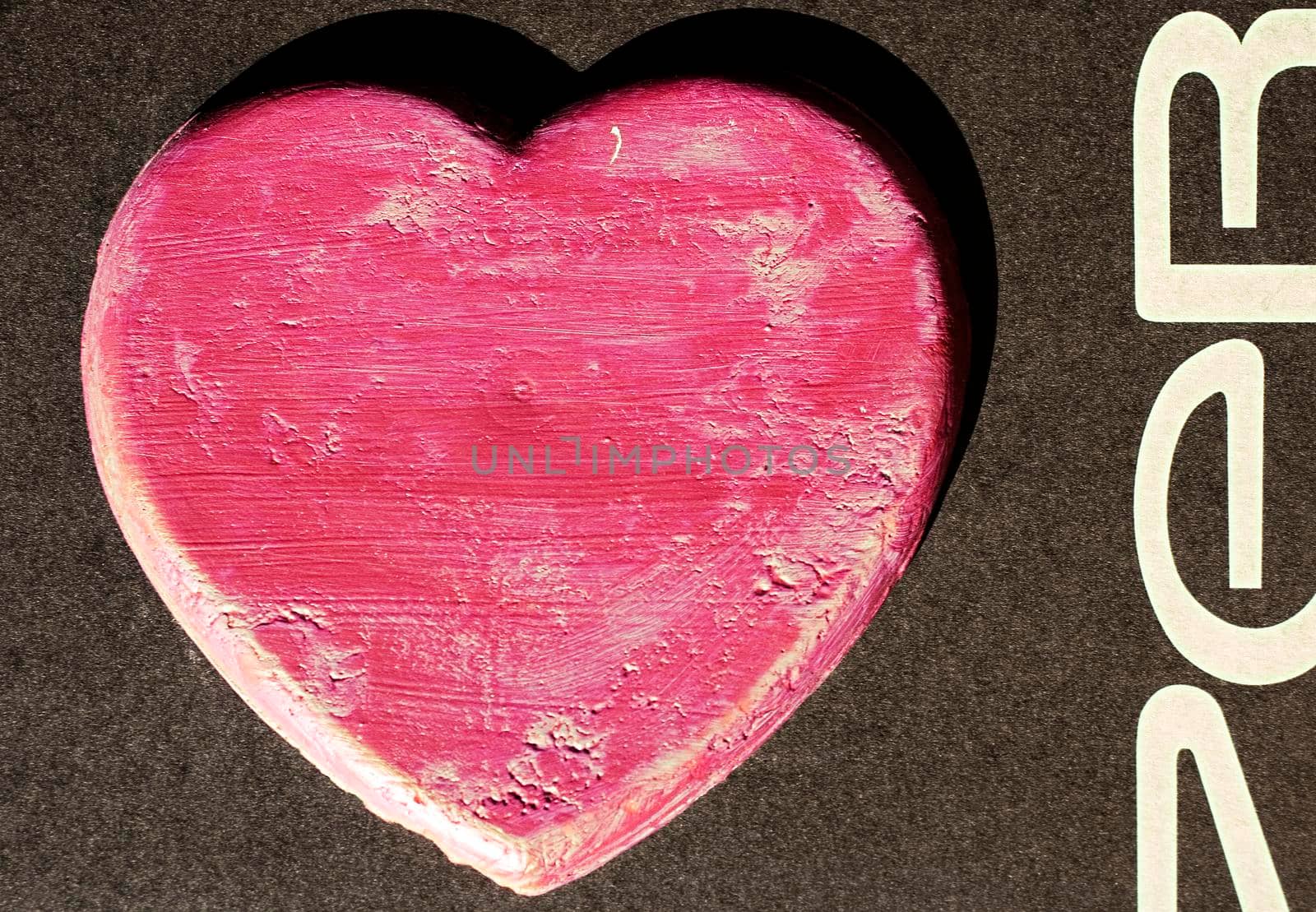 Digital artwork of a red heart on dark background