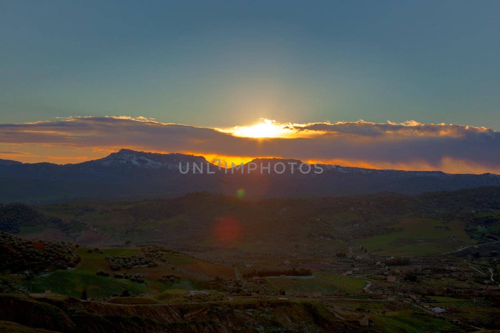 View of Enna and Calascibetta skyline at sunset in the december season