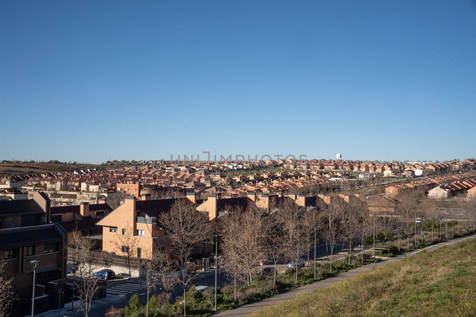 Paracuellos de Jarama, Madrid, Spain townscape from above against clear blue sky in the morning