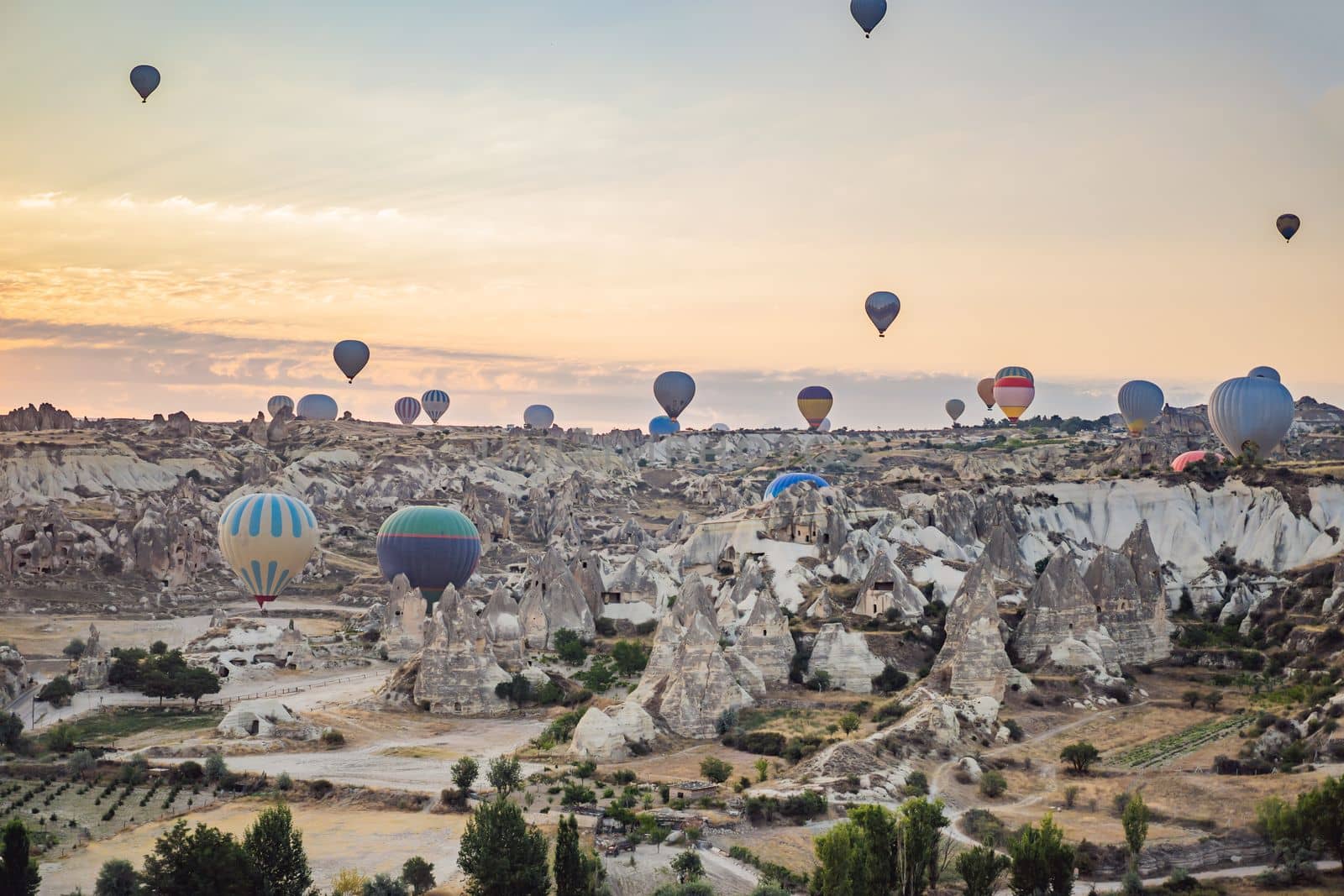 Colorful hot air balloon flying over Cappadocia, Turkey by galitskaya