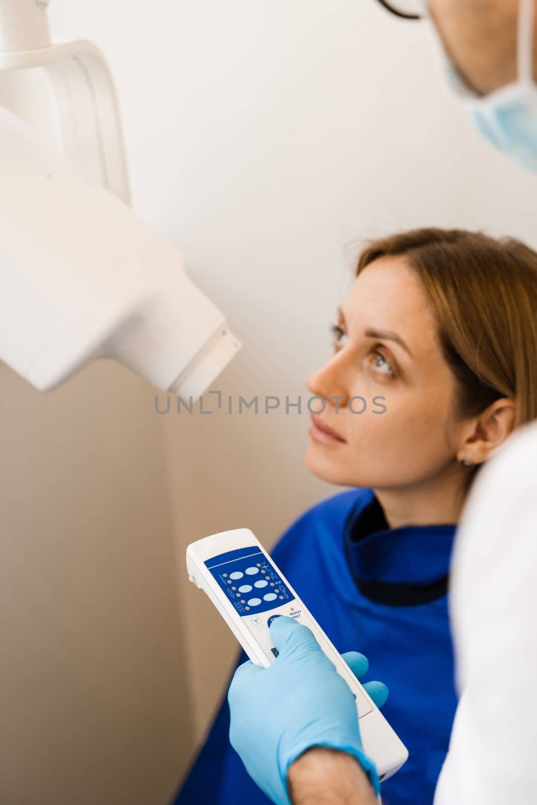 Teeth x ray scanning for detect toothache and treat roots. Dentist do x-ray tooth scan for woman in dentistry. by Rabizo