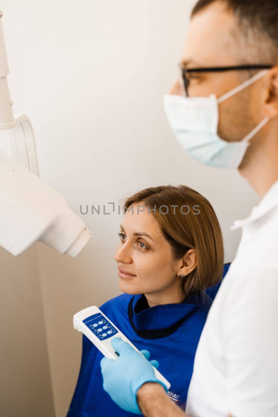 Teeth x ray scanning for detect toothache and treat roots. Dentist do x-ray tooth scan for woman in dentistry. by Rabizo