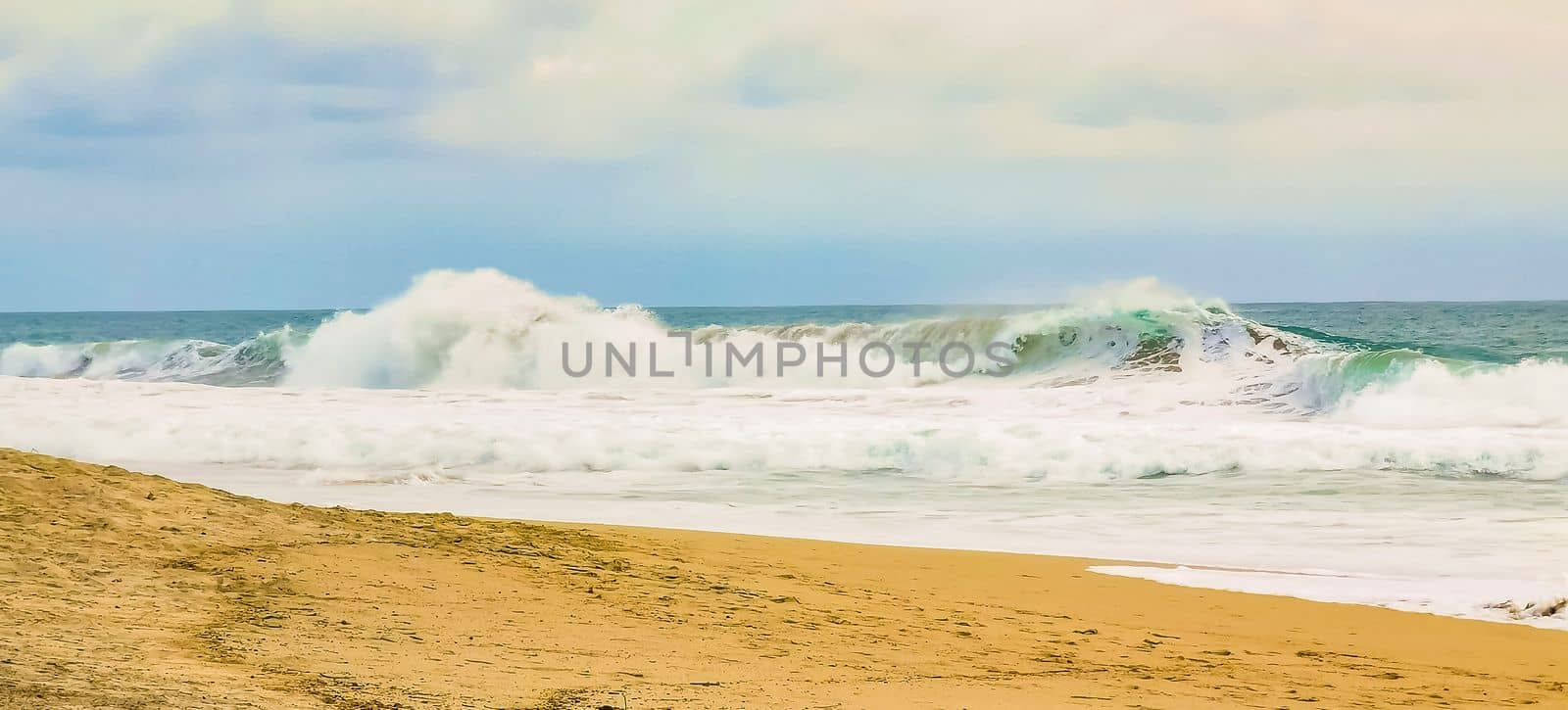 Beach with beautiful huge big surfer waves Puerto Escondido Mexico. by Arkadij