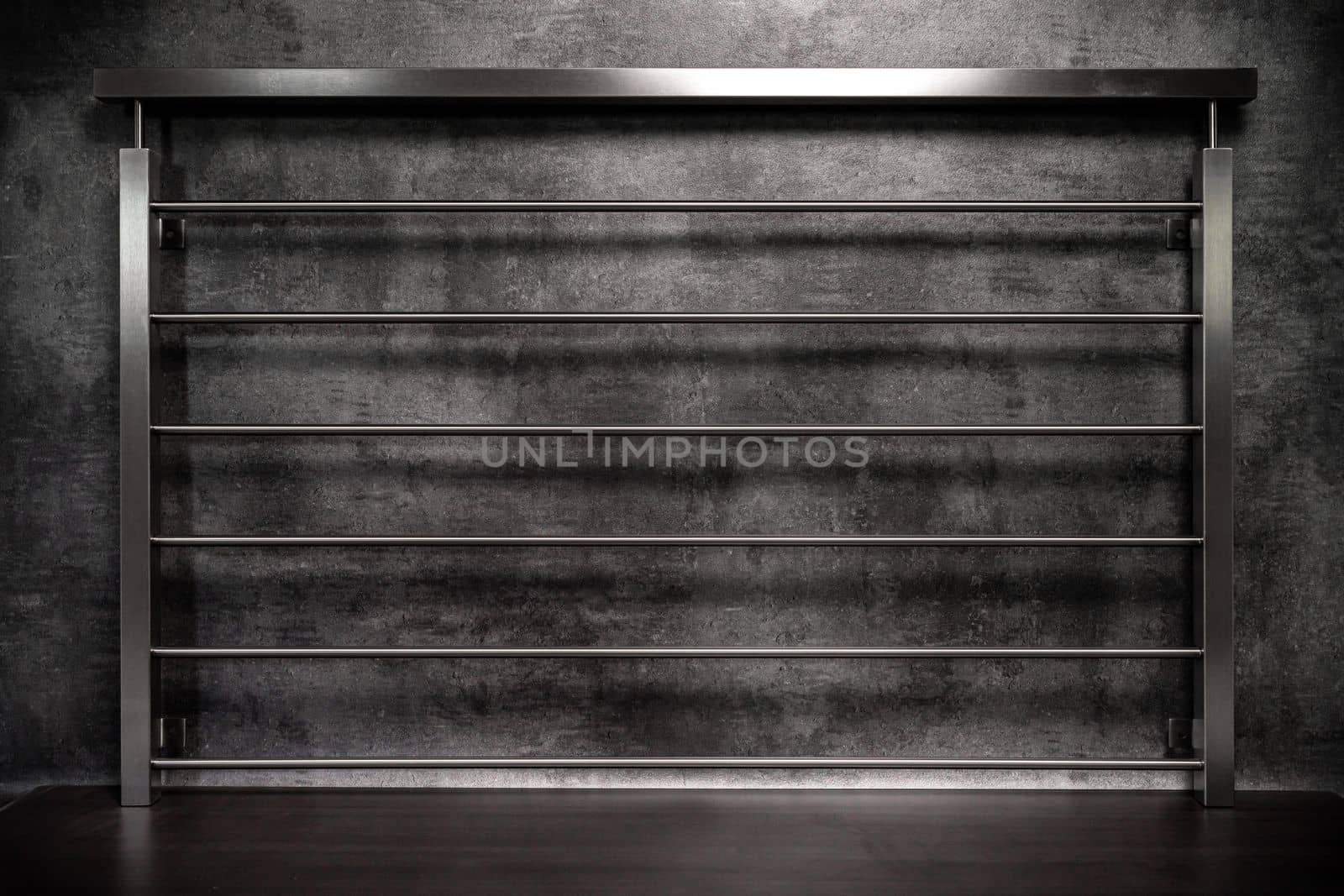 stainless steel railings on a dark background. High quality photo
