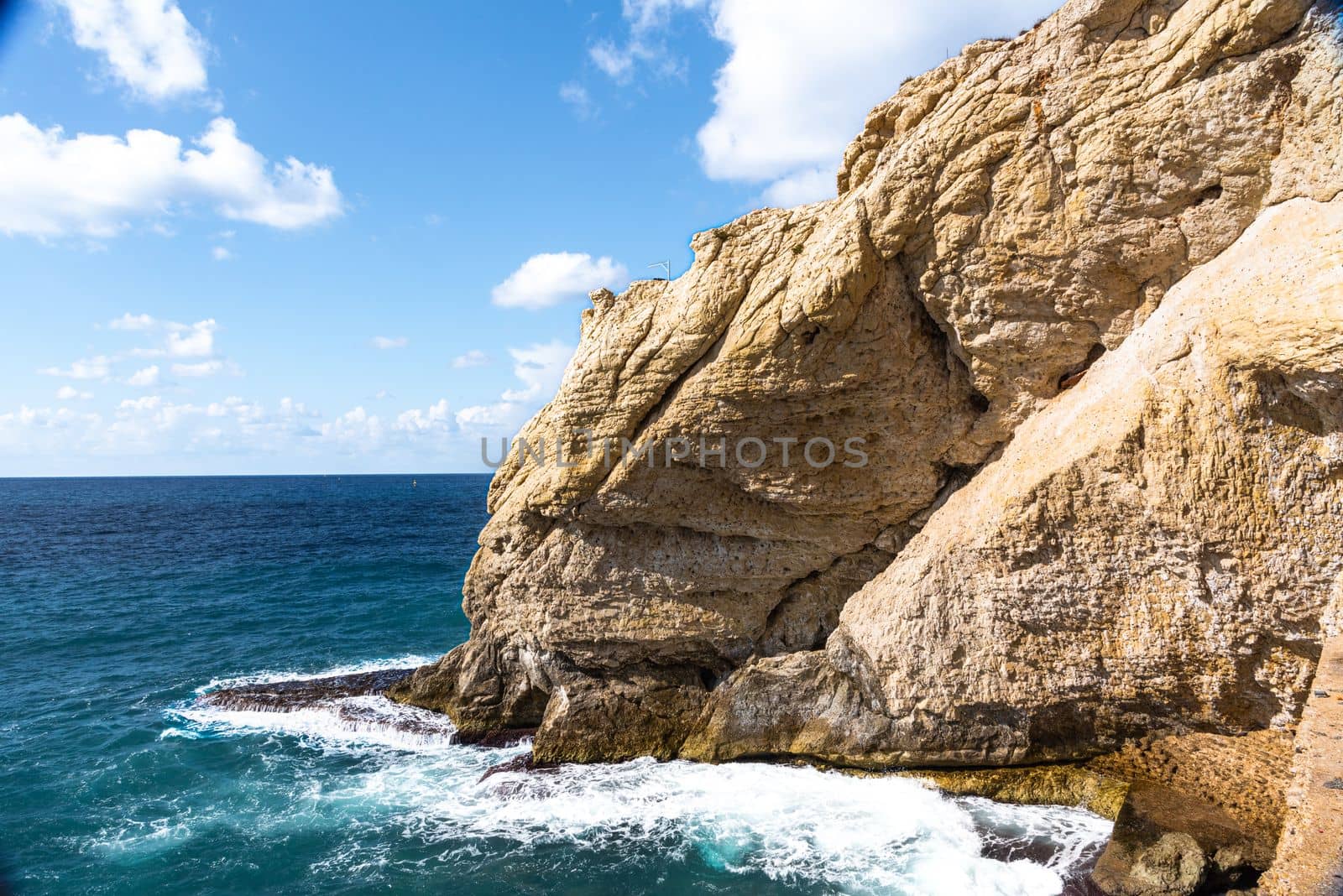 Rosh Hanikra grottoes rocks and caves famous nature tourist site (attraction) in north-western Israel (Galilee region), near Nahariya, in Mediterranean Sea. geological creation in coastline (shore). by avirozen