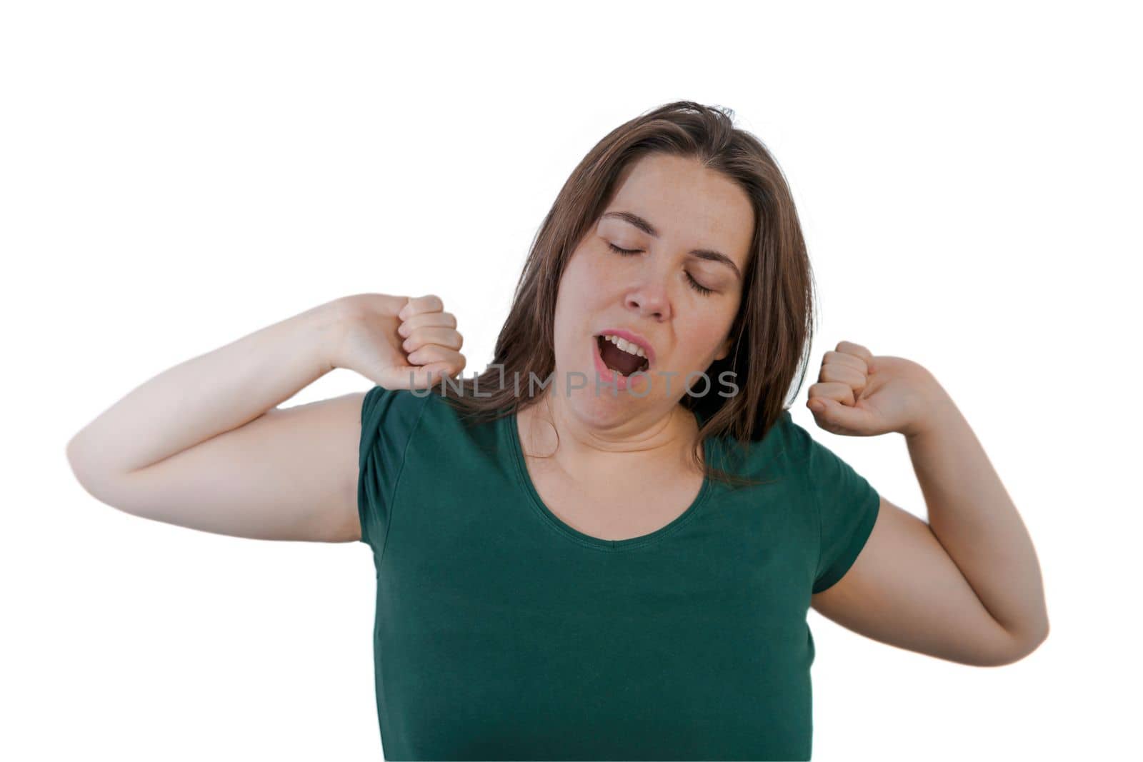 close-up of long-haired brunette woman yawning with hand on face white background