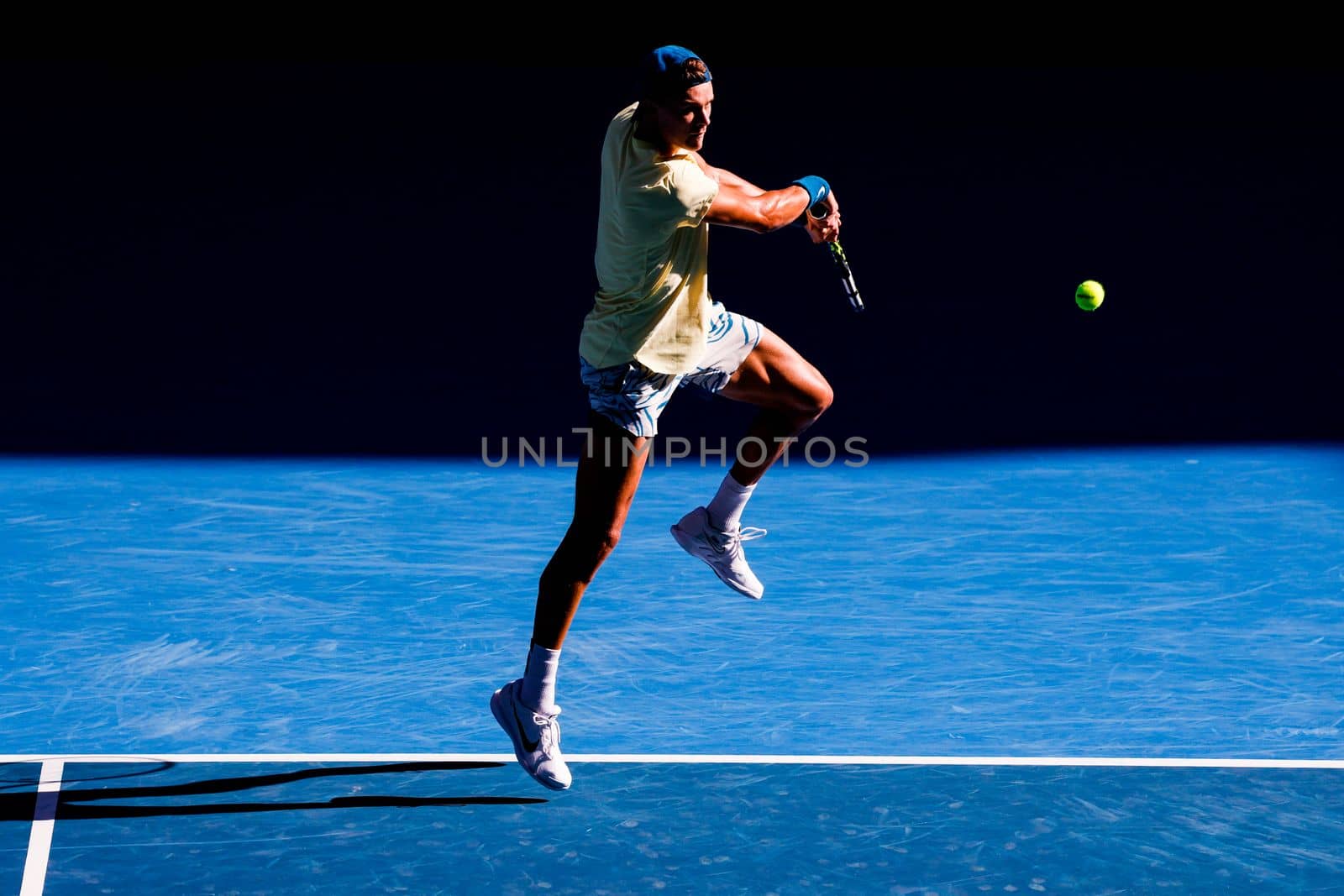 MELBOURNE, AUSTRALIA - JANUARY 23: Holger Rune of Denmark plays Andrey Rublev of Russia in the 4th round on day 8 of the 2023 Australian Open at Melbourne Park on January 23, 2023 in Melbourne, Australia.