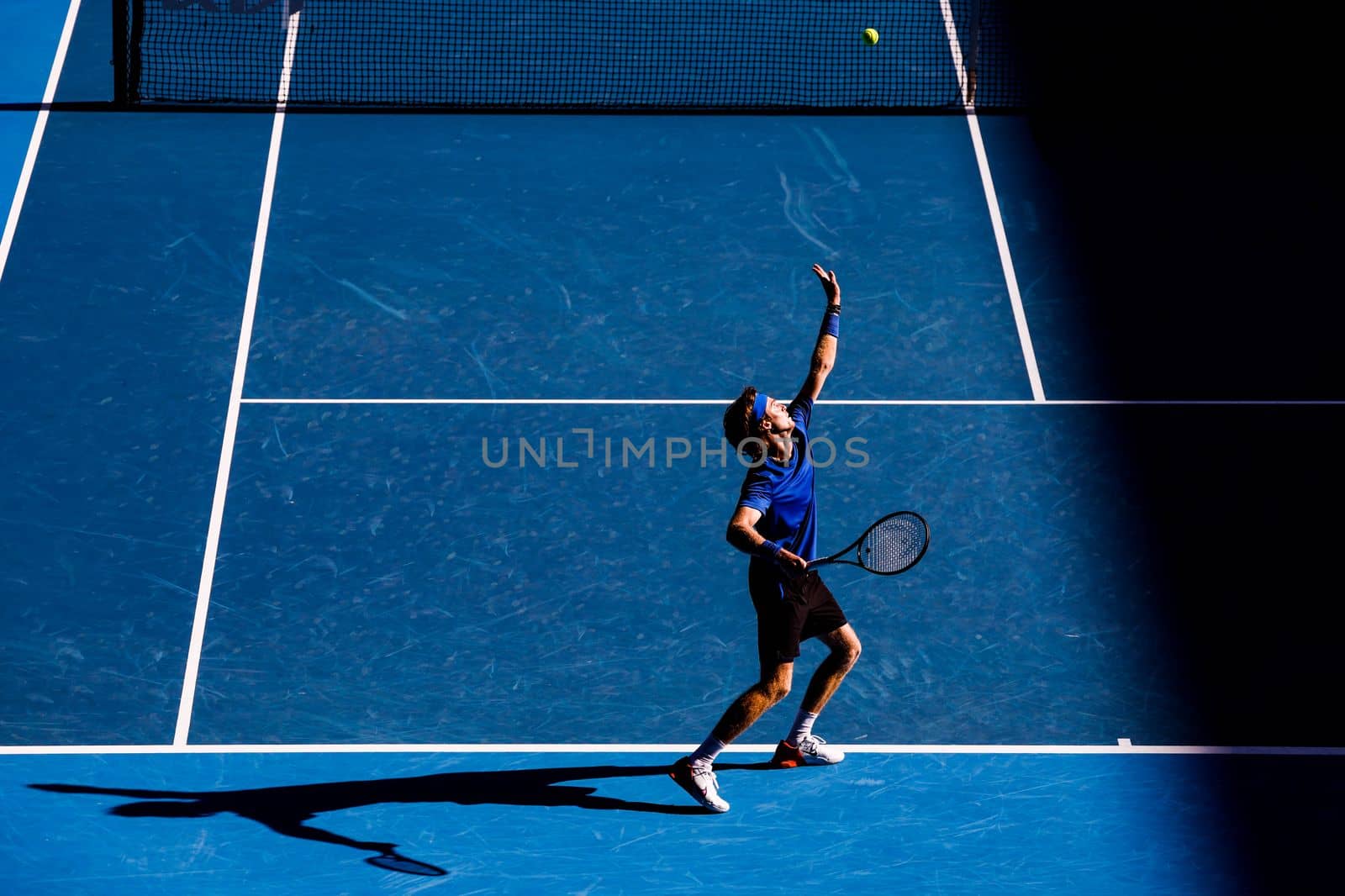 MELBOURNE, AUSTRALIA - JANUARY 23: Andrey Rublev of Russia plays Holger Rune of Denmark in the 4th round on day 8 of the 2023 Australian Open at Melbourne Park on January 23, 2023 in Melbourne, Australia.
