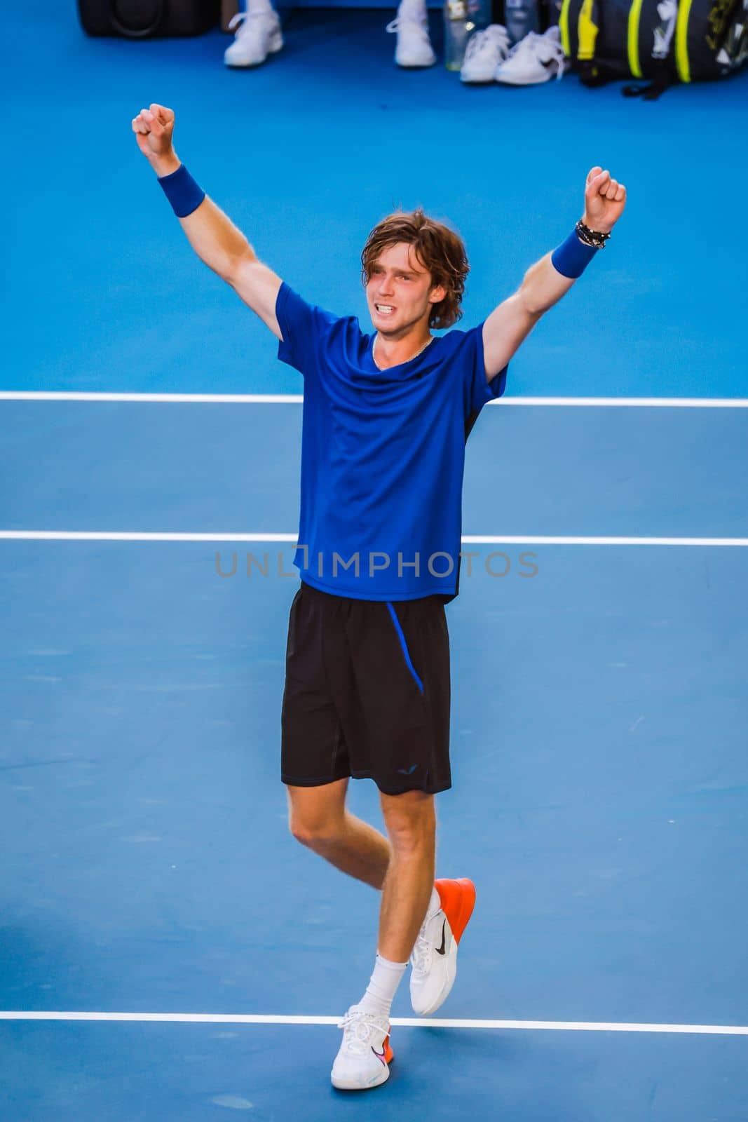 MELBOURNE, AUSTRALIA - JANUARY 23: Andrey Rublev of Russia plays Holger Rune of Denmark in the 4th round on day 8 of the 2023 Australian Open at Melbourne Park on January 23, 2023 in Melbourne, Australia.