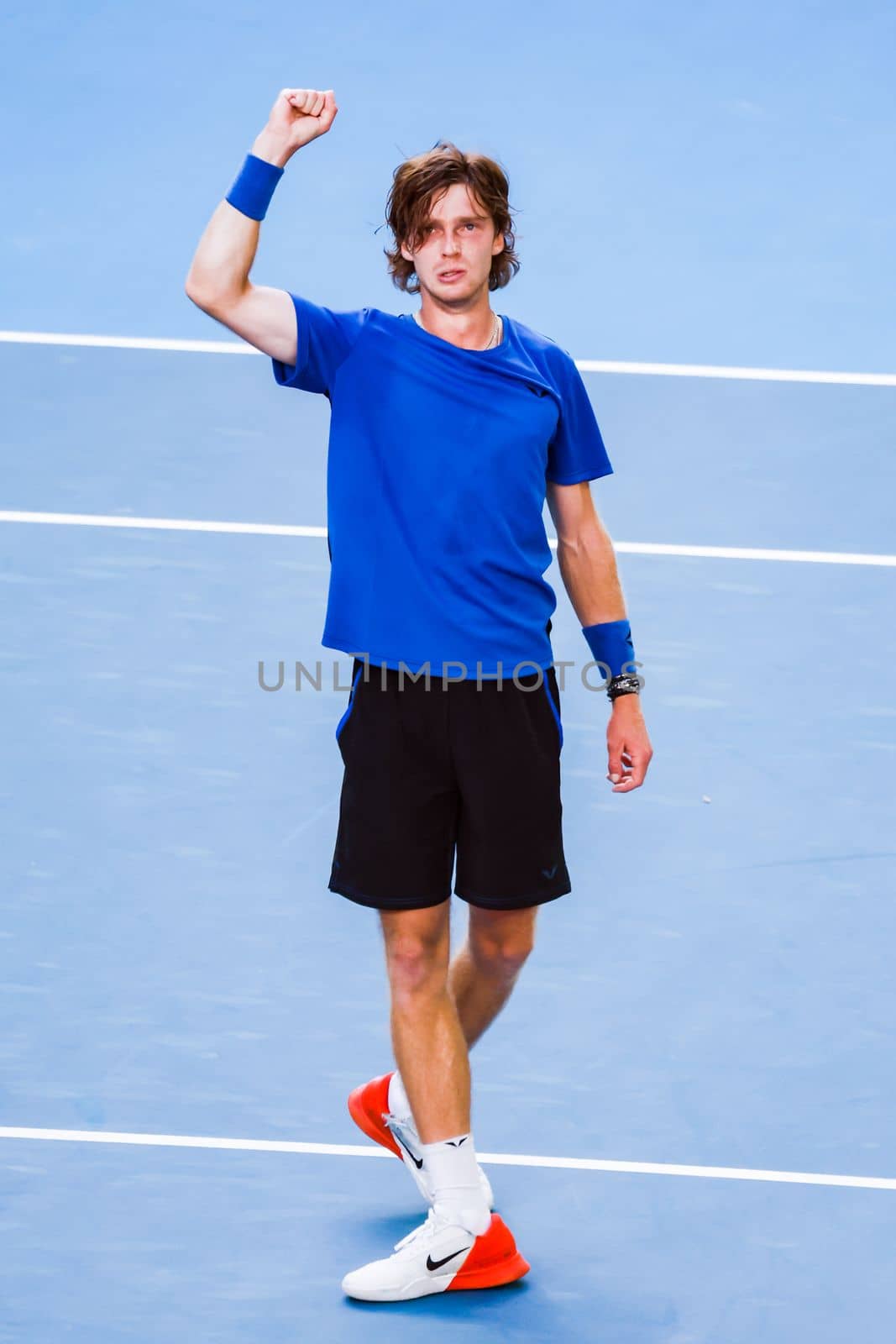 MELBOURNE, AUSTRALIA - JANUARY 23: Andrey Rublev of Russia plays Holger Rune of Denmark in the 4th round on day 8 of the 2023 Australian Open at Melbourne Park on January 23, 2023 in Melbourne, Australia.