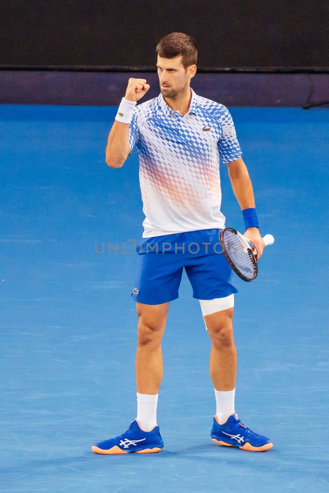 MELBOURNE, AUSTRALIA - JANUARY 23: Novak Djokovic of Serbia plays Alex de Minaur of Australia in the 4th round on day 8 of the 2023 Australian Open at Melbourne Park on January 23, 2023 in Melbourne, Australia.