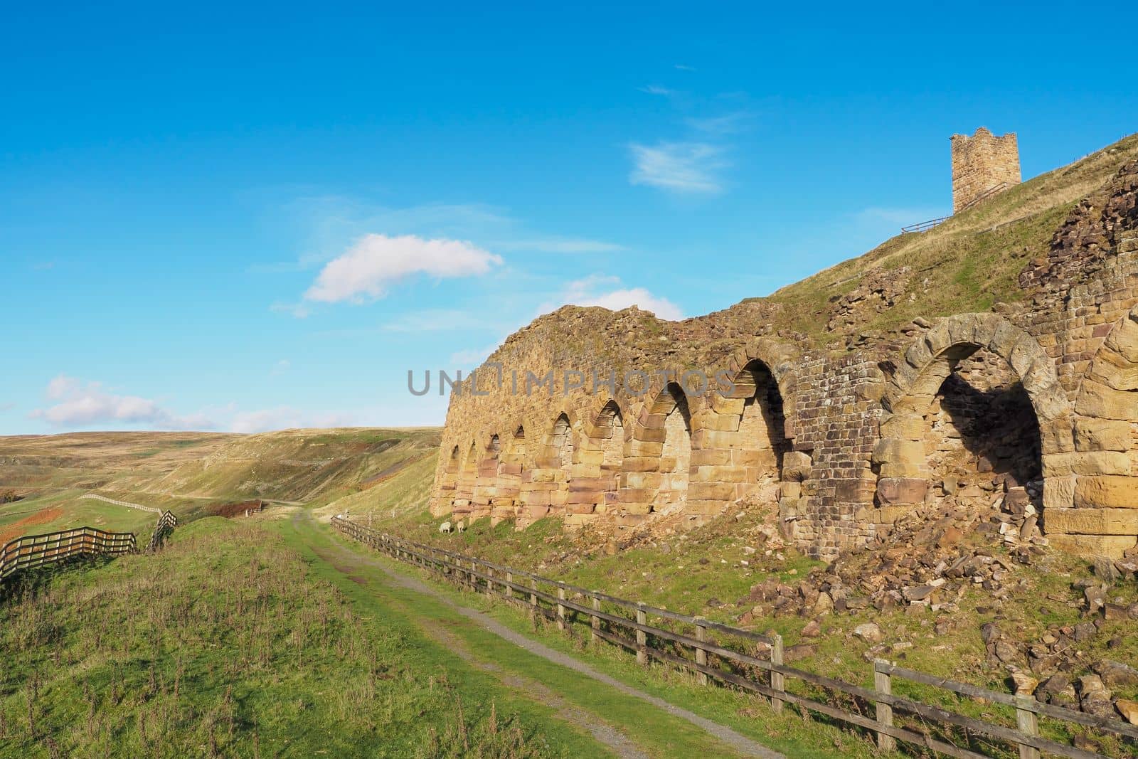 The ruins of the ironstone kilns used for roasting the ore mined from the hillside, East Rosedale Mines on the Rosedale Ironstone Railway, North York Moors National Park, UK