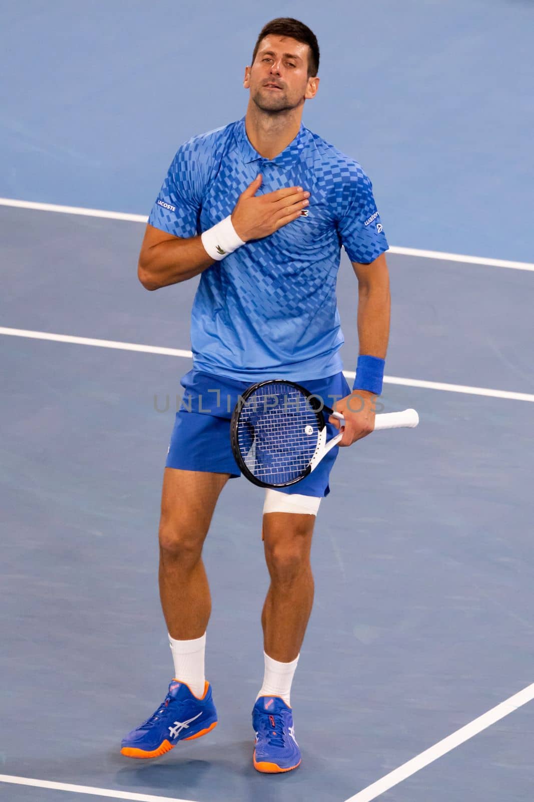 MELBOURNE, AUSTRALIA - JANUARY 23: Novak Djokovic of Serbia celebrates beating Alex de Minaur of Australia in the 4th round on day 8 of the 2023 Australian Open at Melbourne Park on January 23, 2023 in Melbourne, Australia.