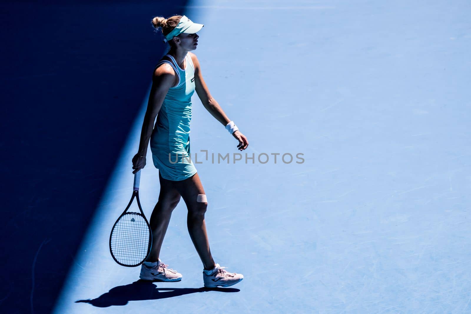 MELBOURNE, AUSTRALIA - JANUARY 23: Magda Linette of Poland plays Caroline Garcia of France on day 8 action of the 2023 Australian Open at Melbourne Park on January 23, 2023 in Melbourne, Australia.