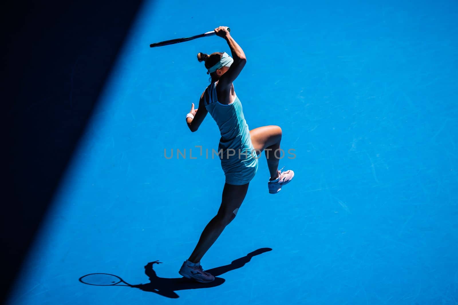 MELBOURNE, AUSTRALIA - JANUARY 23: Magda Linette of Poland plays Caroline Garcia of France on day 8 action of the 2023 Australian Open at Melbourne Park on January 23, 2023 in Melbourne, Australia.
