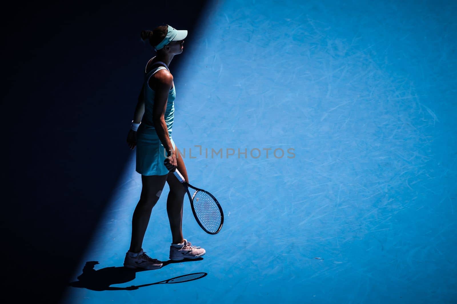 MELBOURNE, AUSTRALIA - JANUARY 23: Magda Linette of Poland plays Caroline Garcia of France on day 8 action of the 2023 Australian Open at Melbourne Park on January 23, 2023 in Melbourne, Australia.