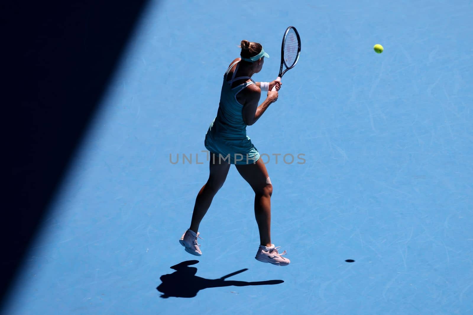 MELBOURNE, AUSTRALIA - JANUARY 23: Magda Linette of Poland plays Caroline Garcia of France on day 8 action of the 2023 Australian Open at Melbourne Park on January 23, 2023 in Melbourne, Australia.