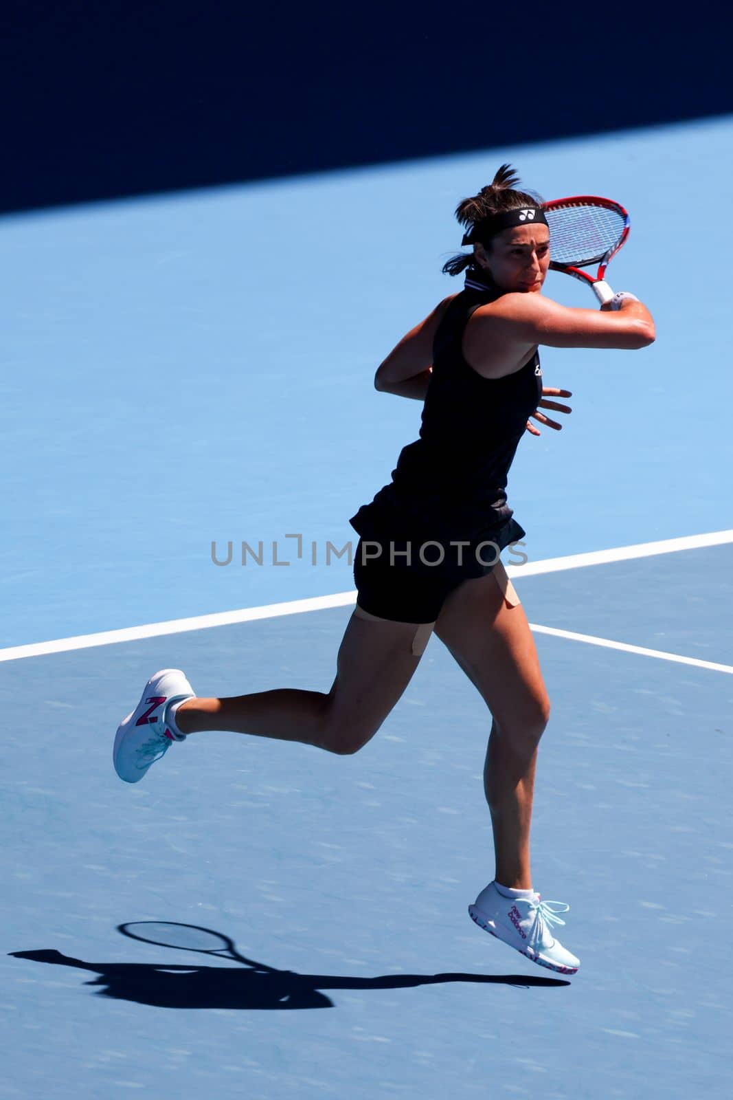 MELBOURNE, AUSTRALIA - JANUARY 23: Caroline Garcia of France plays against Magda Linette of Poland on day 8 action of the 2023 Australian Open at Melbourne Park on January 23, 2023 in Melbourne, Australia.