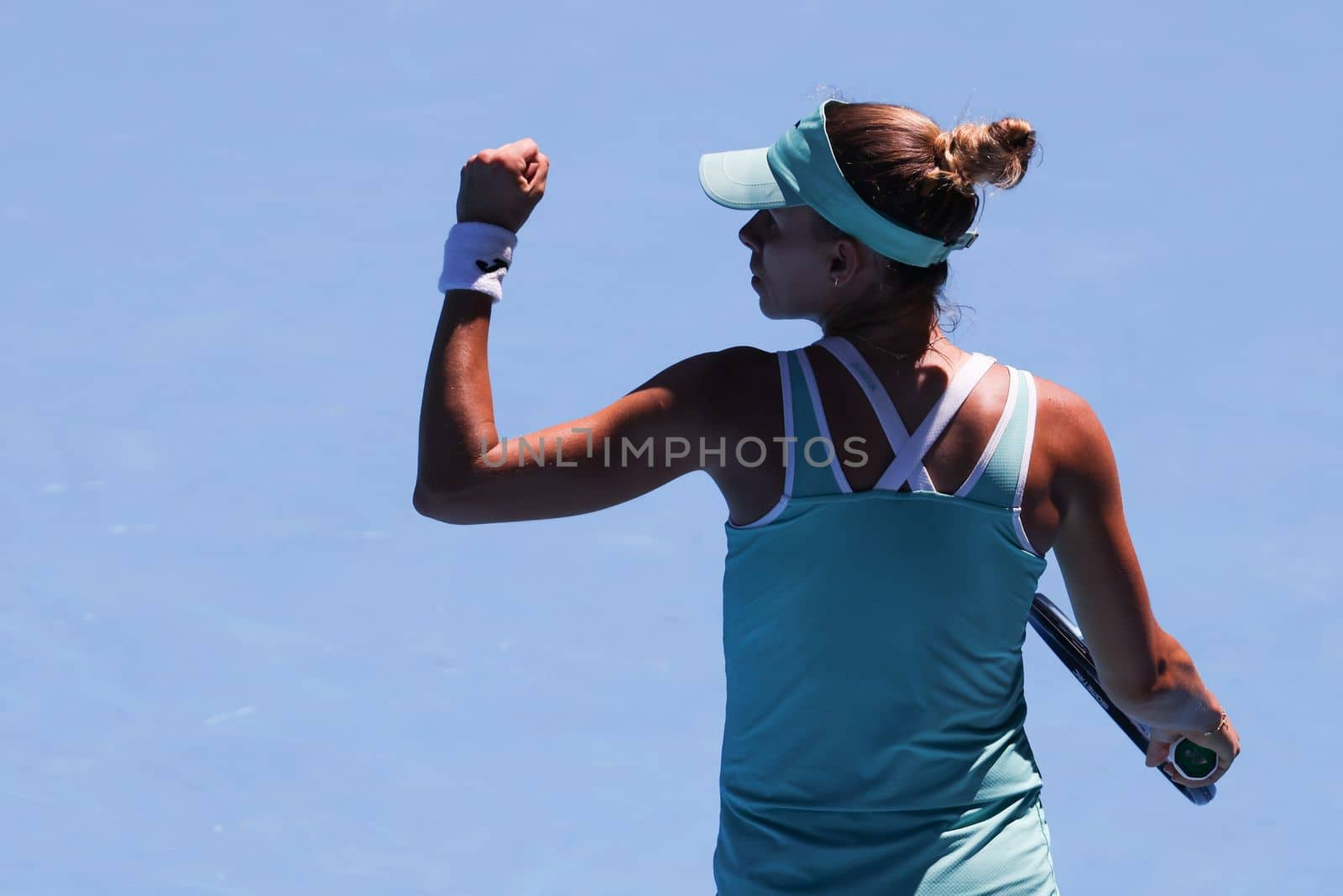 MELBOURNE, AUSTRALIA - JANUARY 23: Magda Linette of Poland plays Caroline Garcia of France on day 8 action of the 2023 Australian Open at Melbourne Park on January 23, 2023 in Melbourne, Australia.