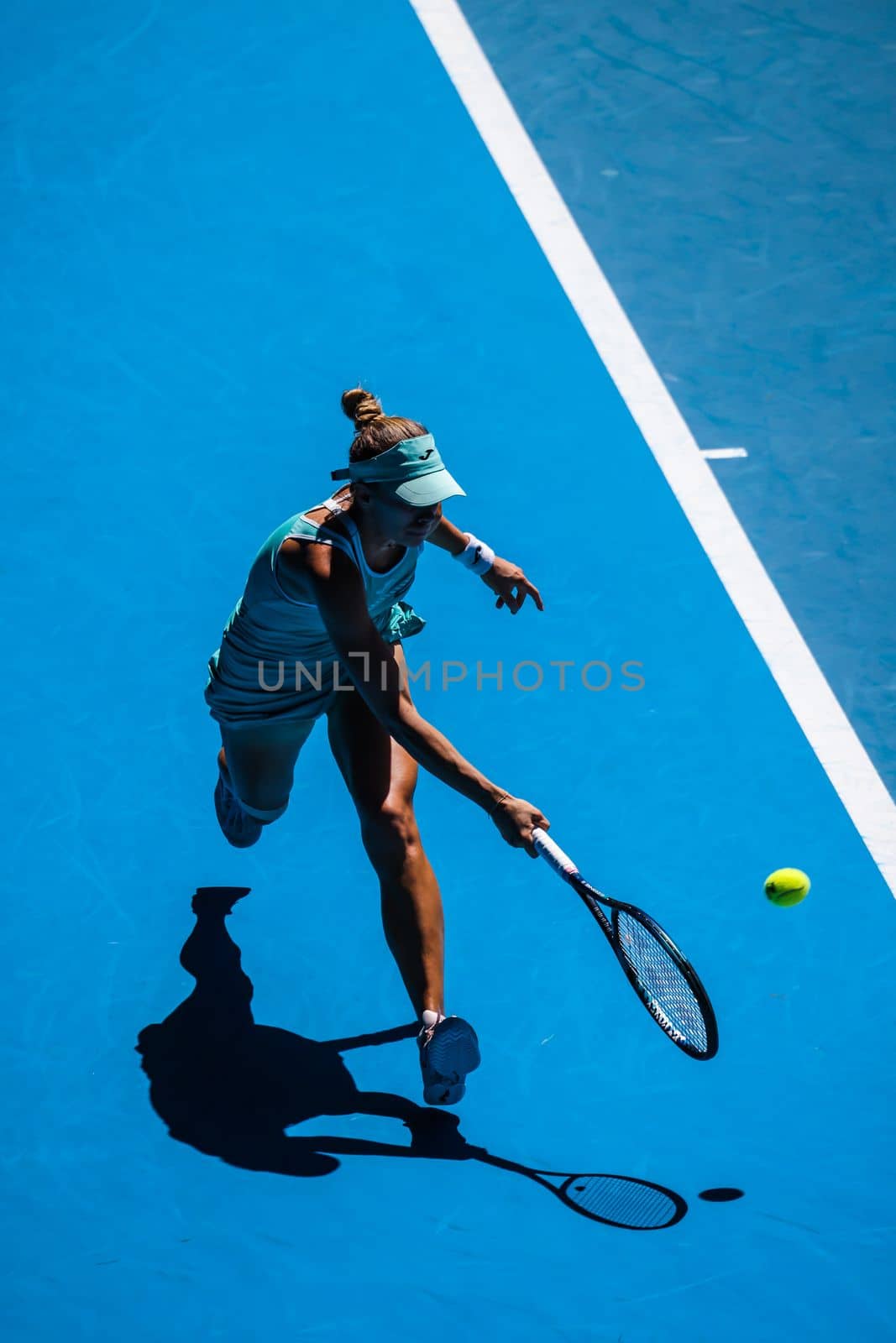 MELBOURNE, AUSTRALIA - JANUARY 23: Magda Linette of Poland plays Caroline Garcia of France on day 8 action of the 2023 Australian Open at Melbourne Park on January 23, 2023 in Melbourne, Australia.