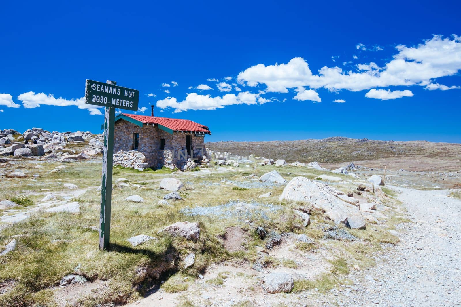 The historic Seamans Hut in Kosciuszko National Park between Mt Kosciuszko and Charlotte Pass on a clear summer's day, in the Snowy Mountains, New South Wales, Australia